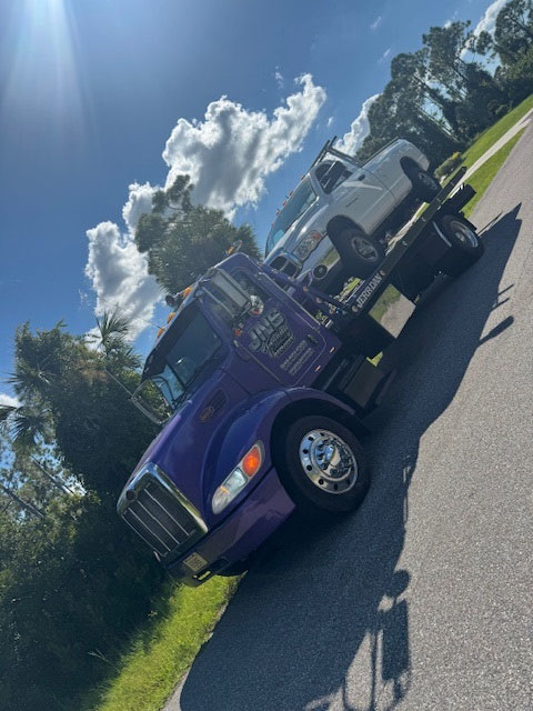 Towing a white truck