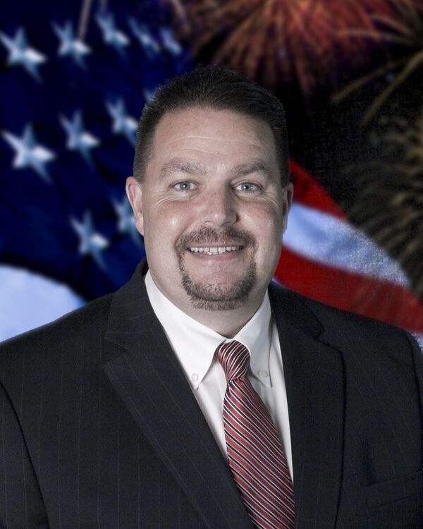 Travis Conti - Travis B. Conti & Associates RE/MAX