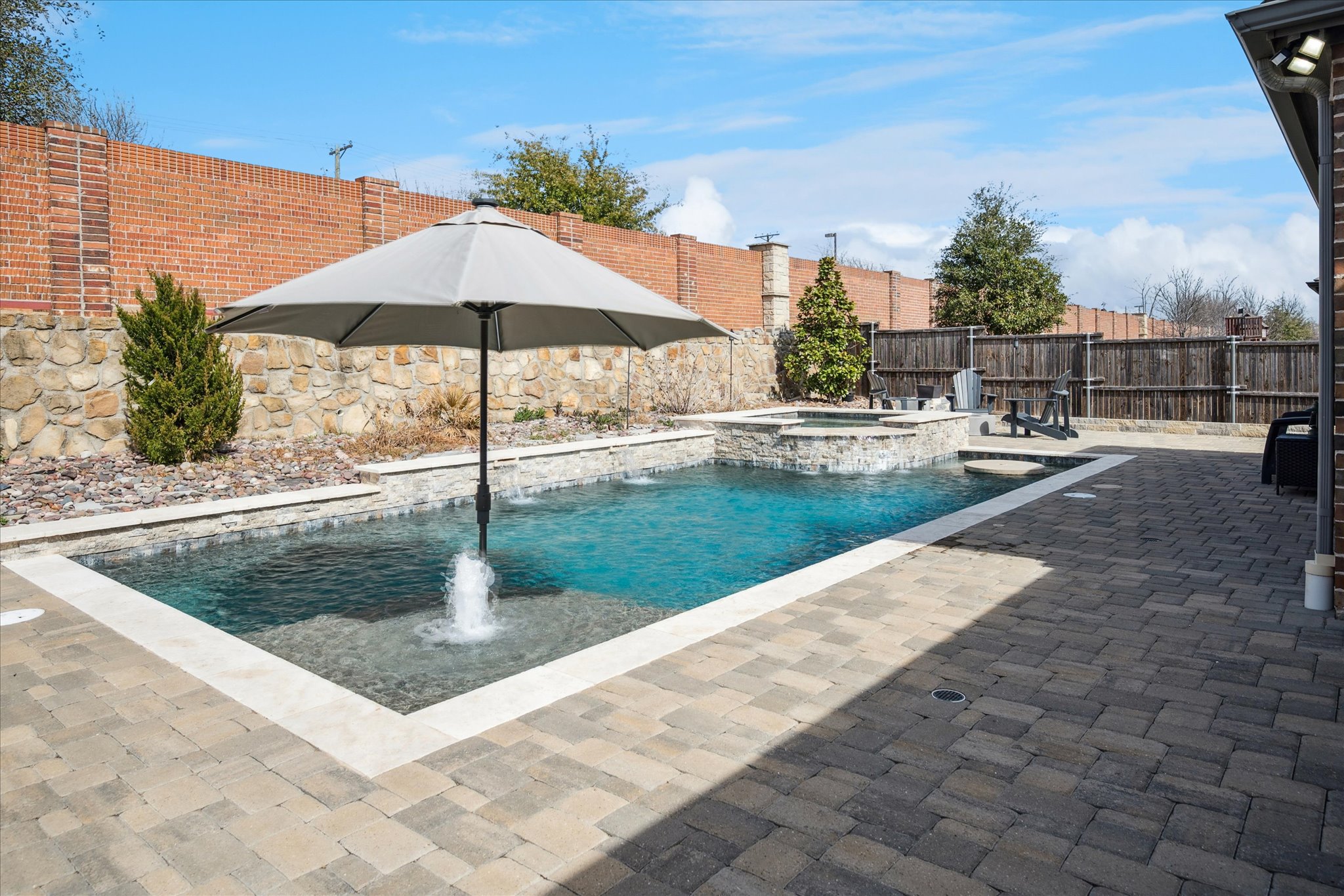 Luxury backyard with pool and spa