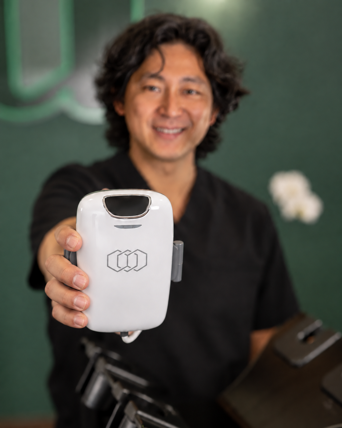 Clinical provider demonstrating the Tone by InMode hands-free applicator