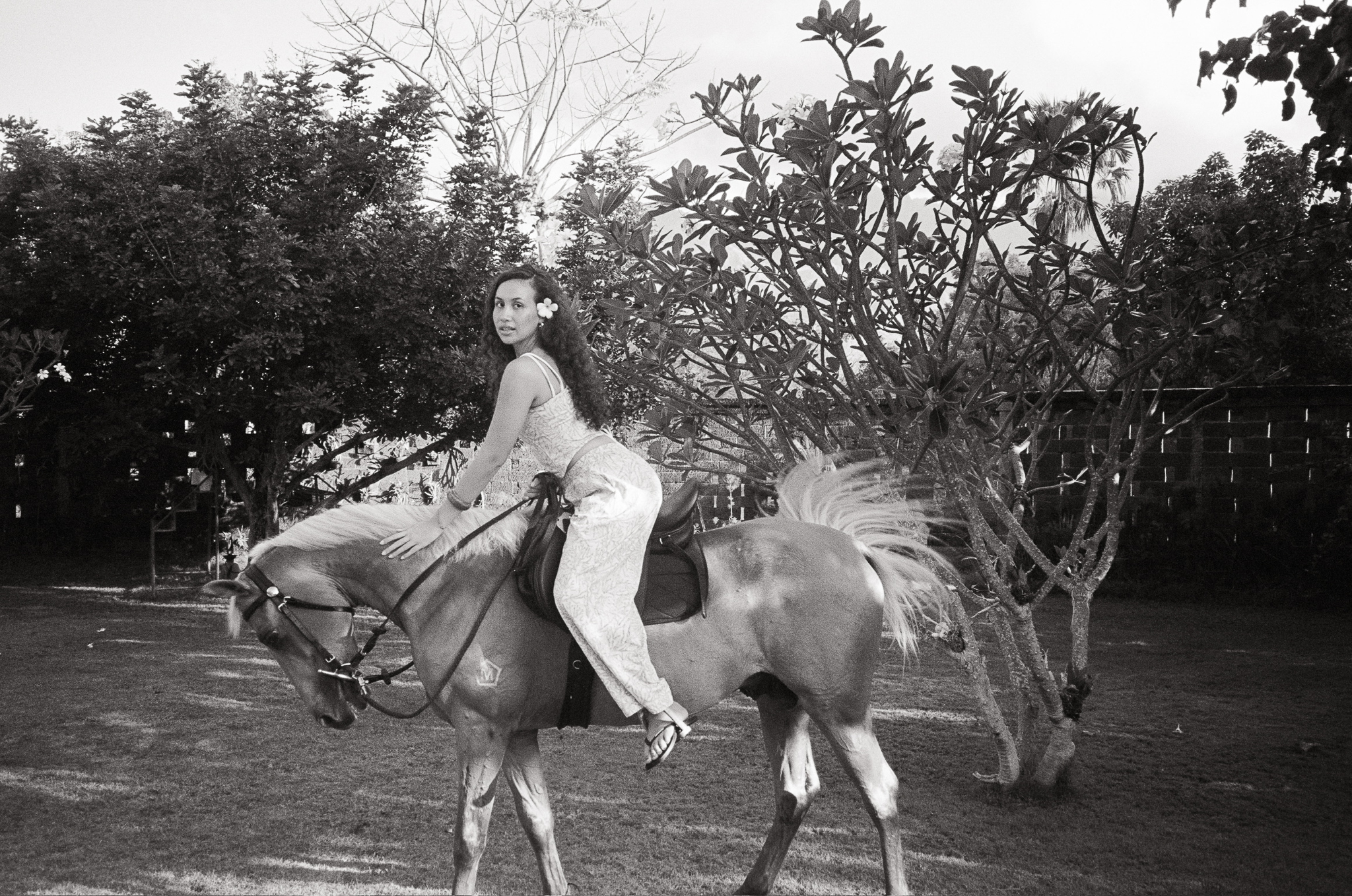 Island of the Gods - Woman on Horse in Garden B&W