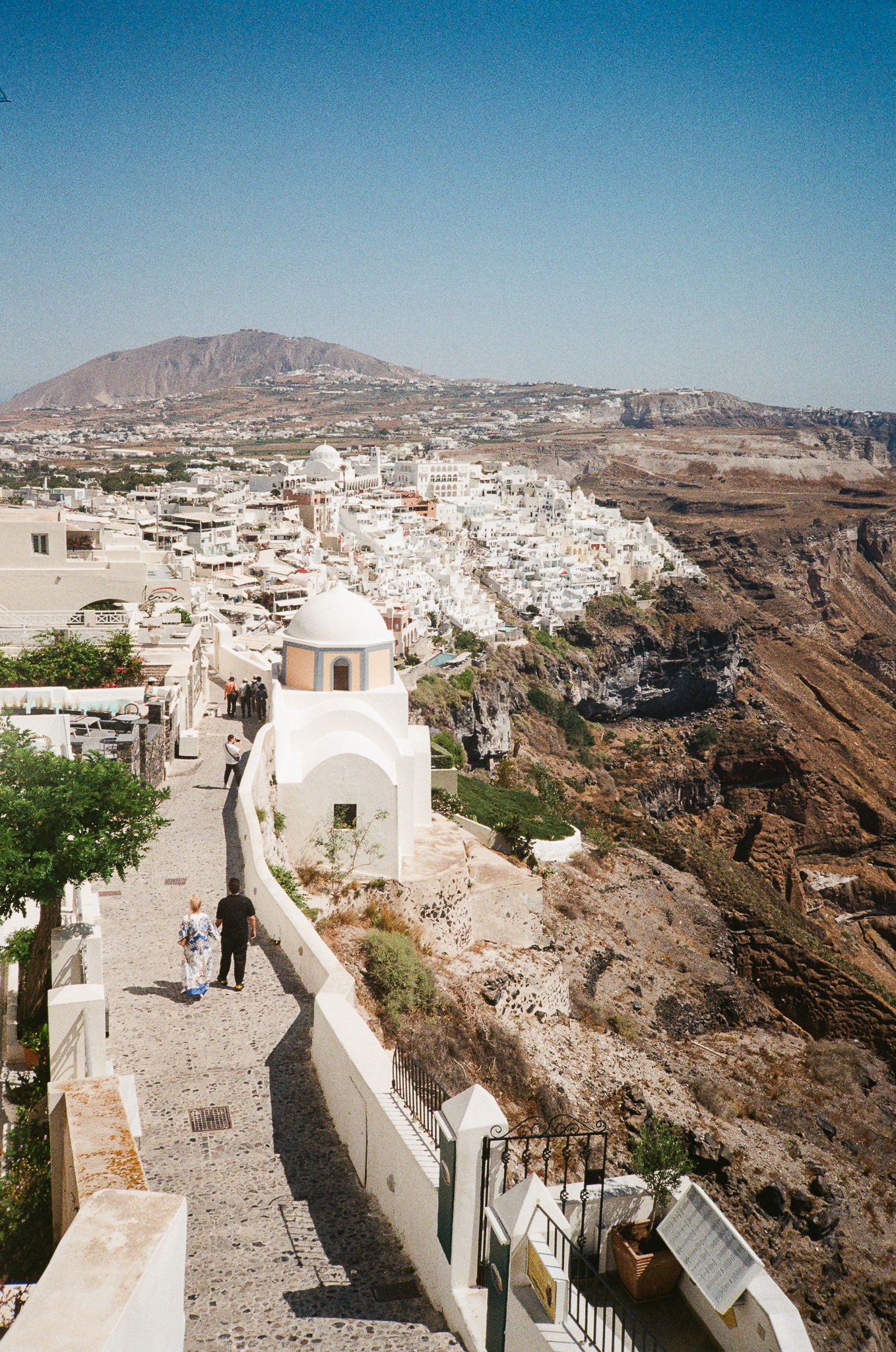 Stories of Greece - Santorini Blue Dome Pathway with People