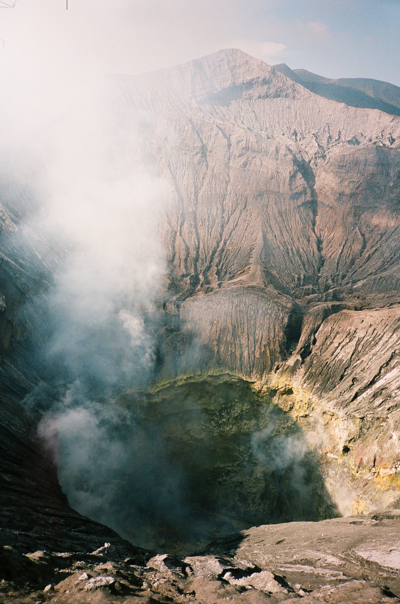Echoes of Bromo - Volcanic Crater with Smoke and Sulfur Lake