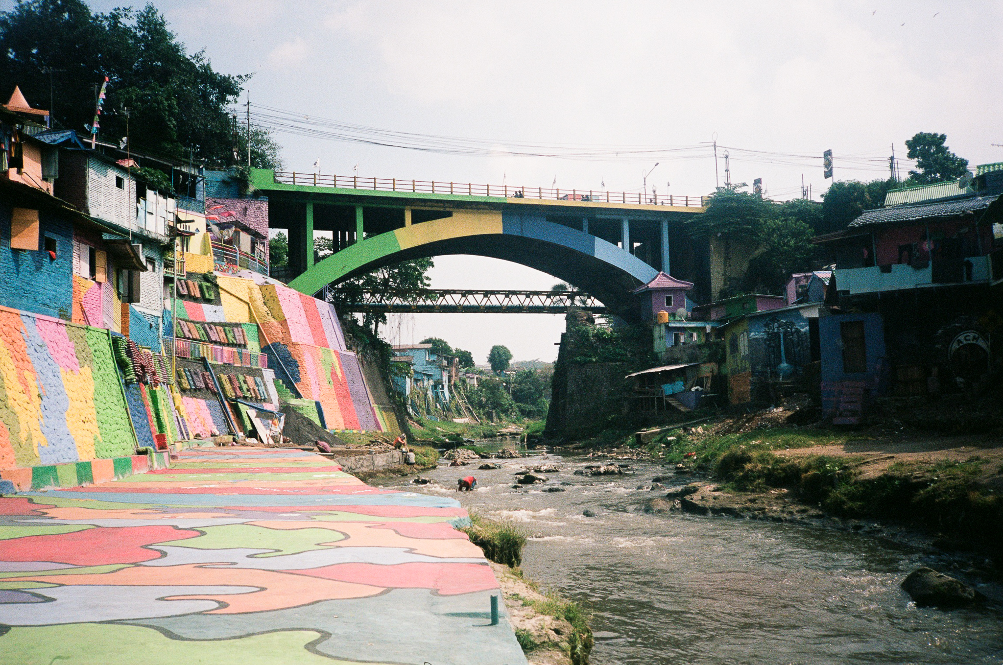 Echoes of Bromo - Rainbow Village with Colorful Bridge
