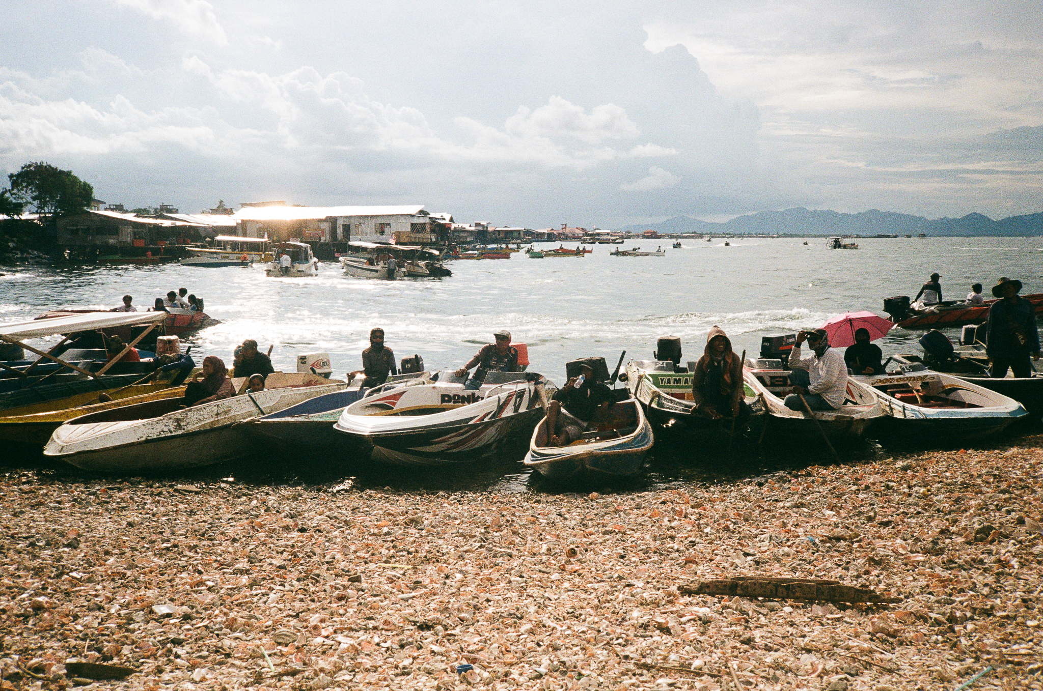 People of the Sea - Boats at Shoreline