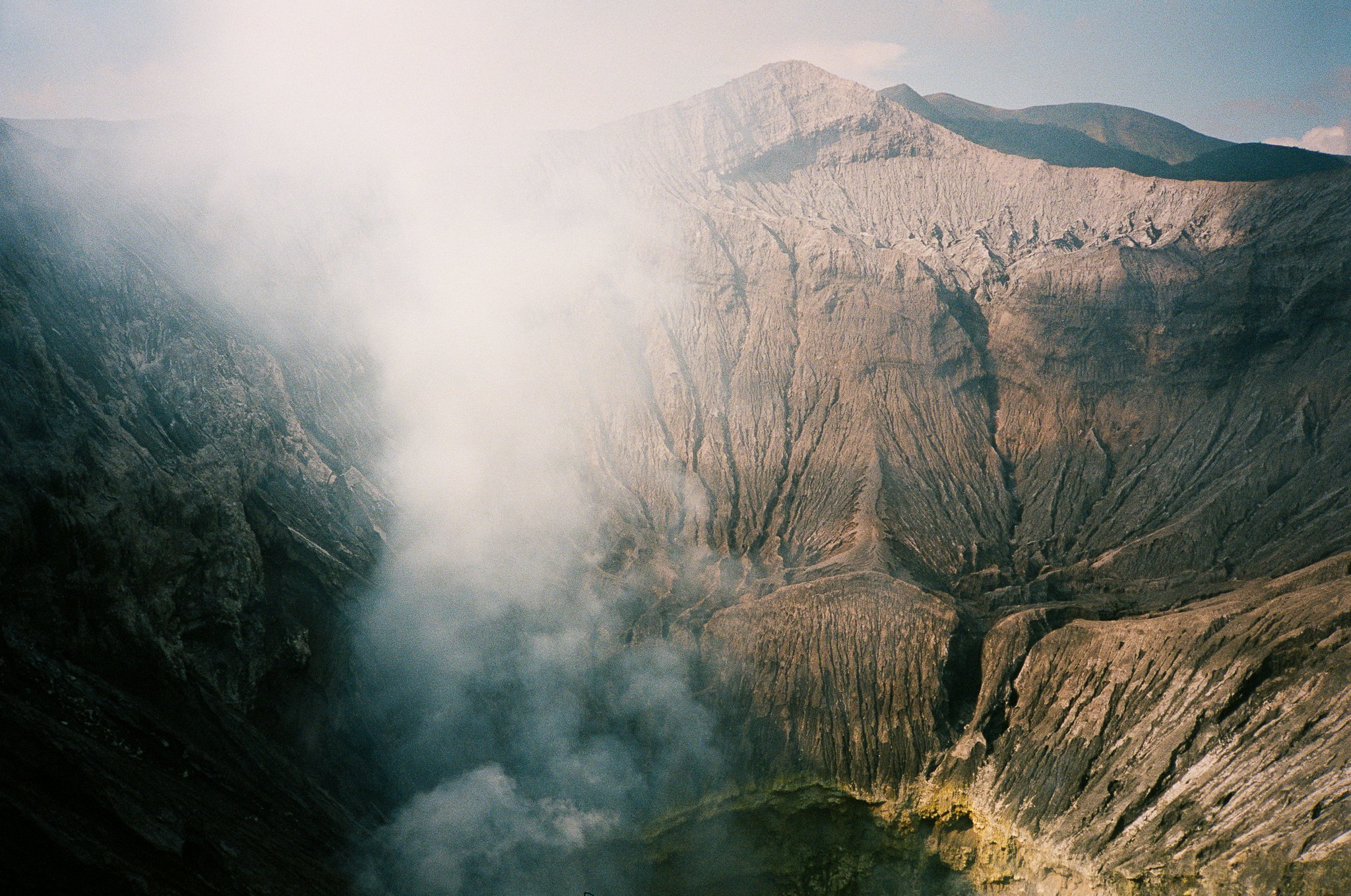 Echoes of Bromo - Wide Volcanic Landscape with Mist and Ridges