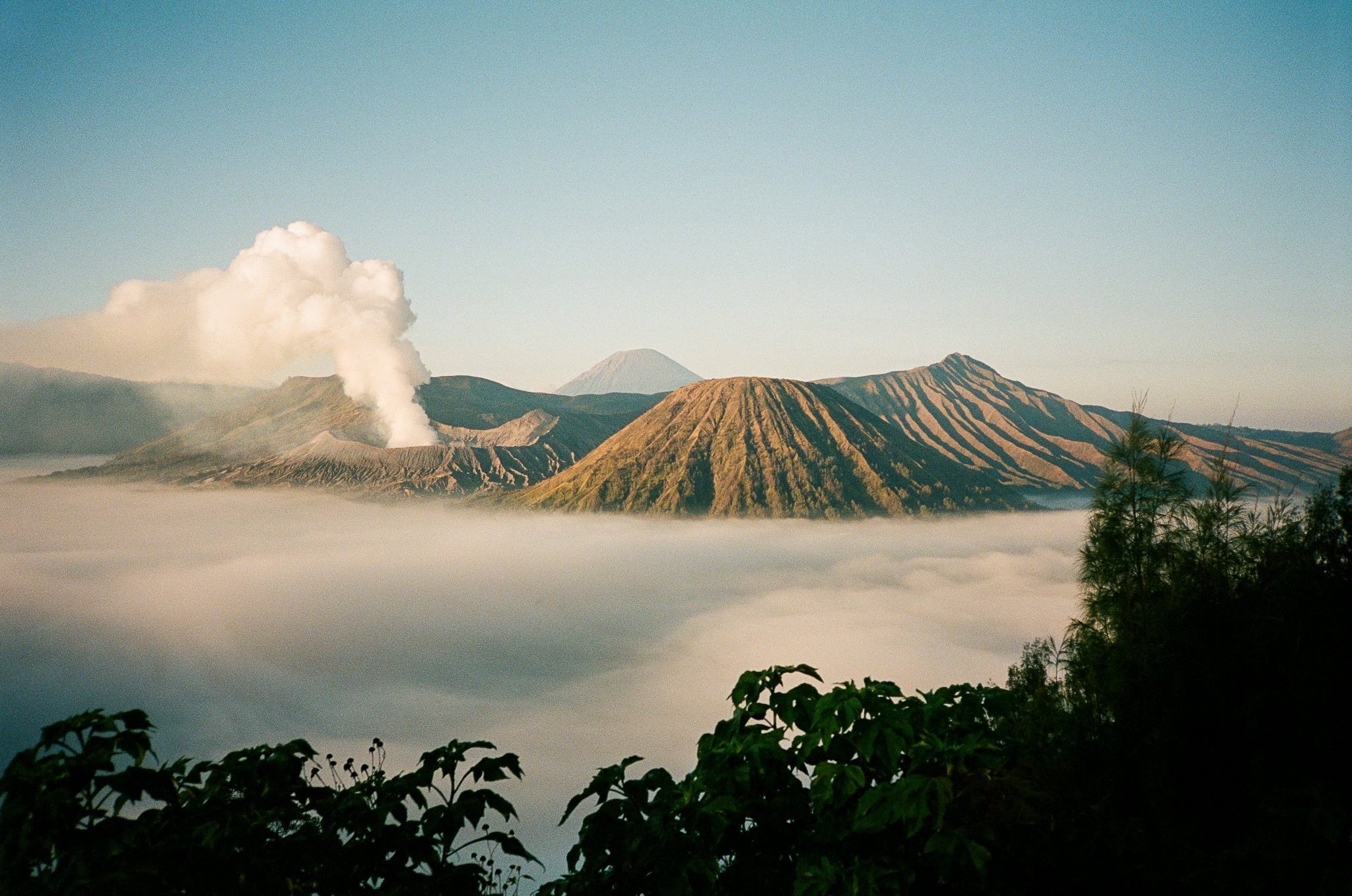 Echoes of Bromo - Volcano Smoke Plume Above Sea of Clouds