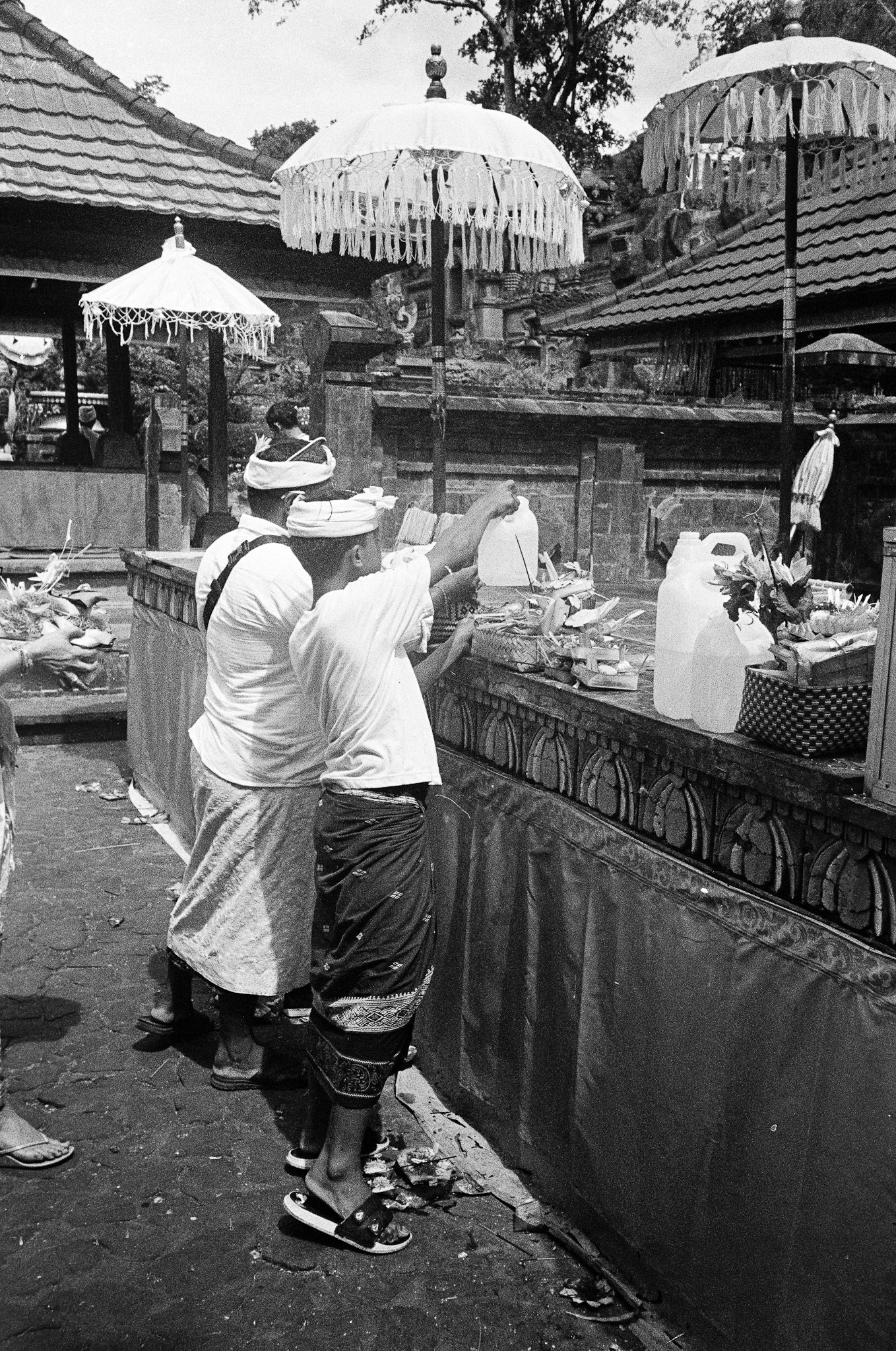 Island of the Gods - Balinese Ceremony with Umbrellas and Offerings B&W