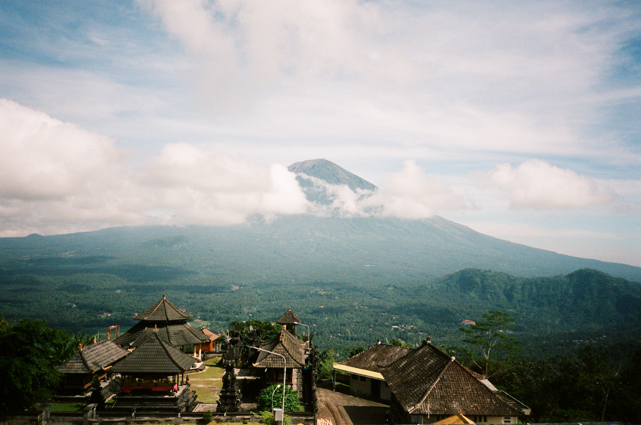 Island of the Gods - Temple Complex with Volcano and Clouds