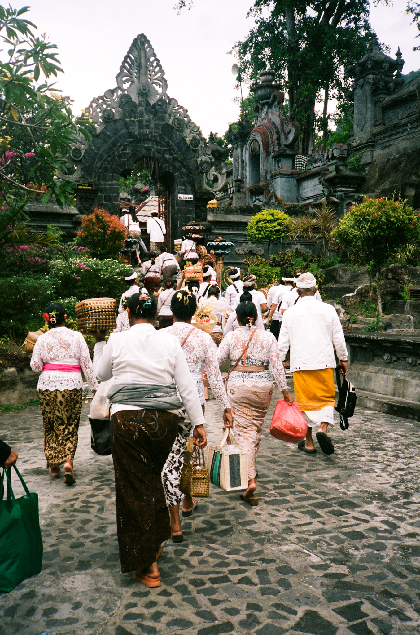 Balinese Ceremony - People Walking Towards Temple with Offerings