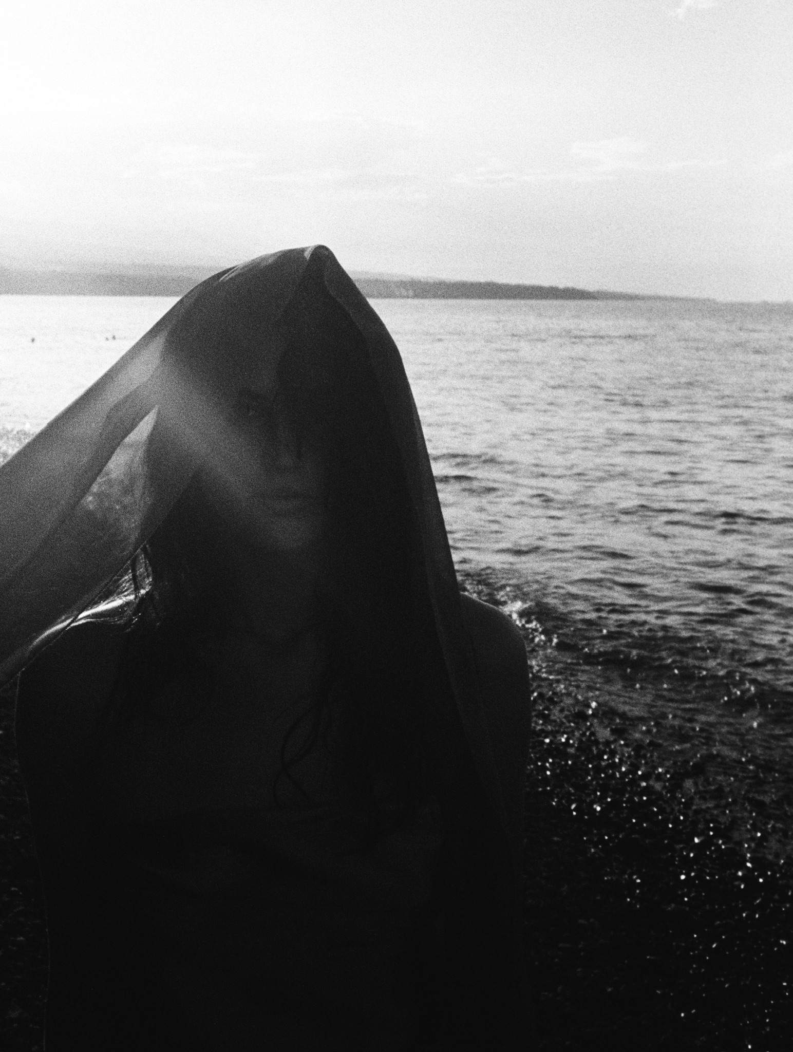 Brother and Sisterhood - Woman with Veil by Ocean B&W
