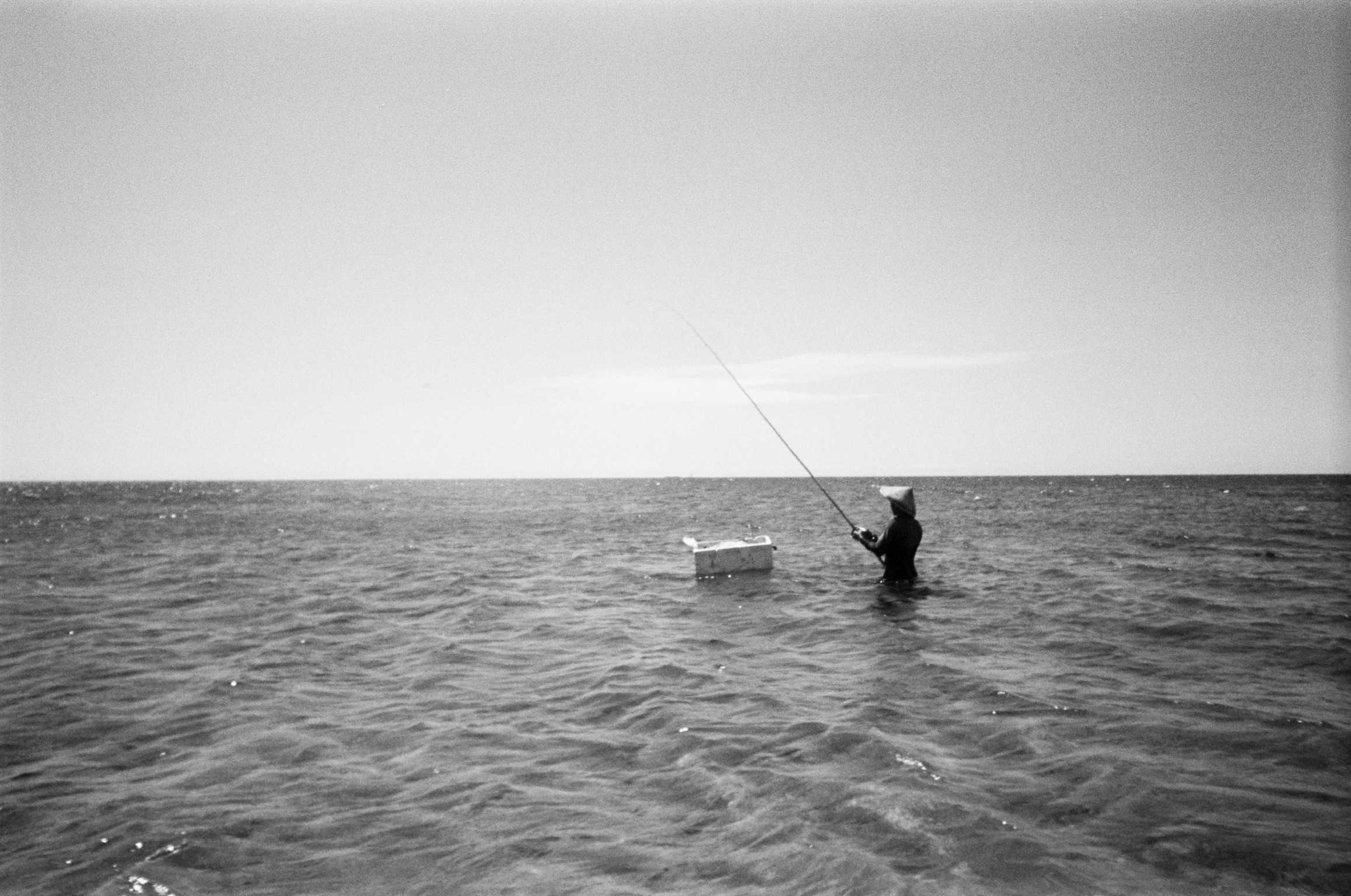 Island of the Gods - Fisherman in Ocean B&W