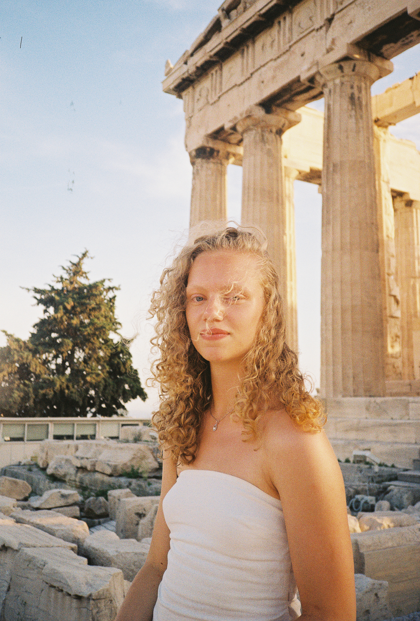 Stories of Greece - Woman at Ancient Greek Temple Ruins