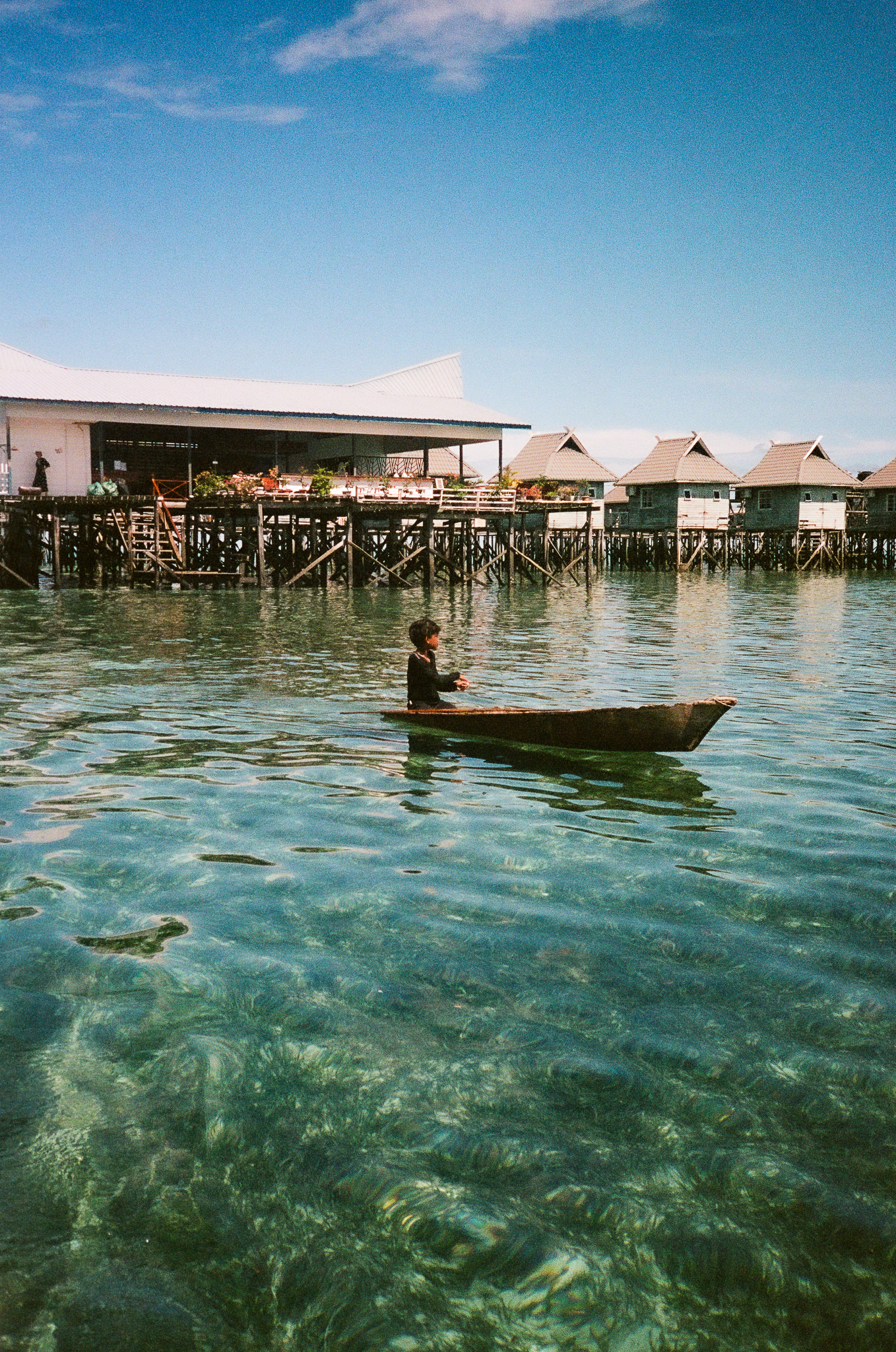 People of the Sea - Boy on Turquoise Water