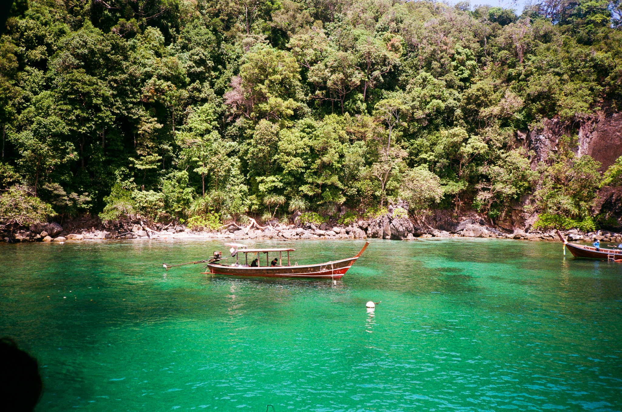 Golden moments in Thailand - Longtail Boat on Turquoise Water