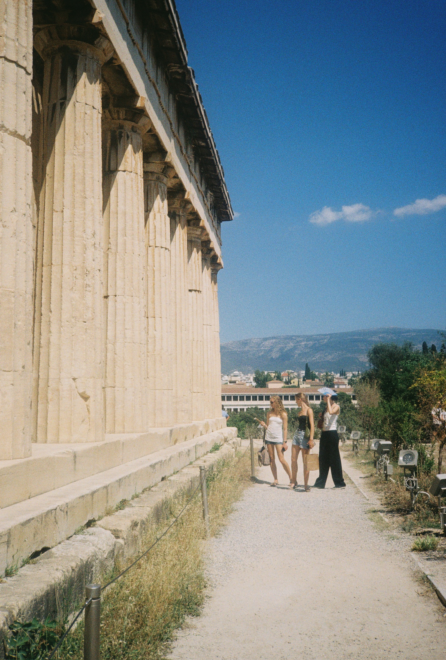 Stories of Greece - Three Women by Temple Columns