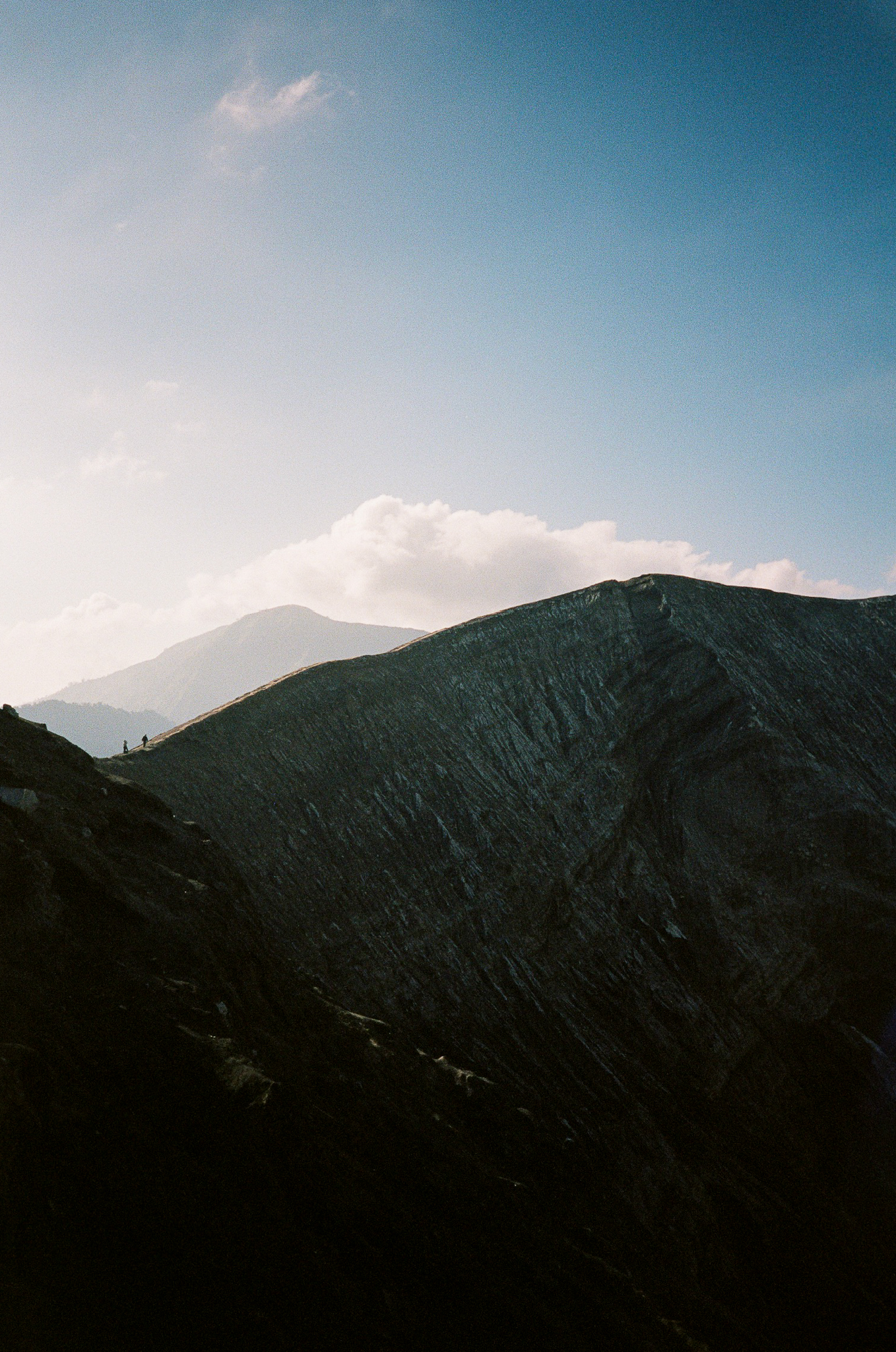 Echoes of Bromo - Mountain Ridge with Silhouettes at Dawn