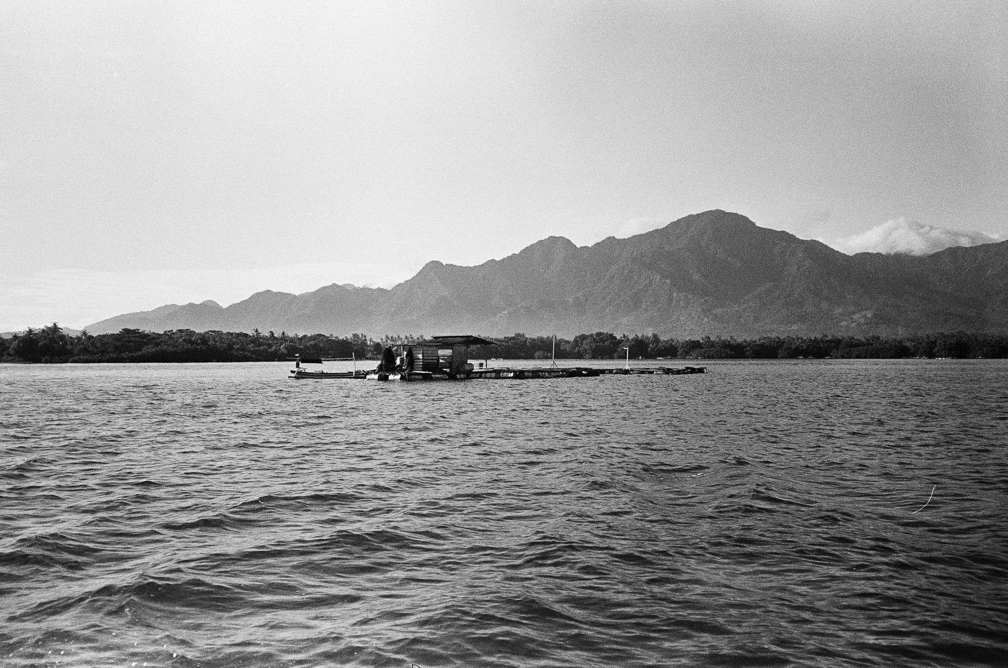 Island of the Gods - Lake with Floating House and Mountains B&W