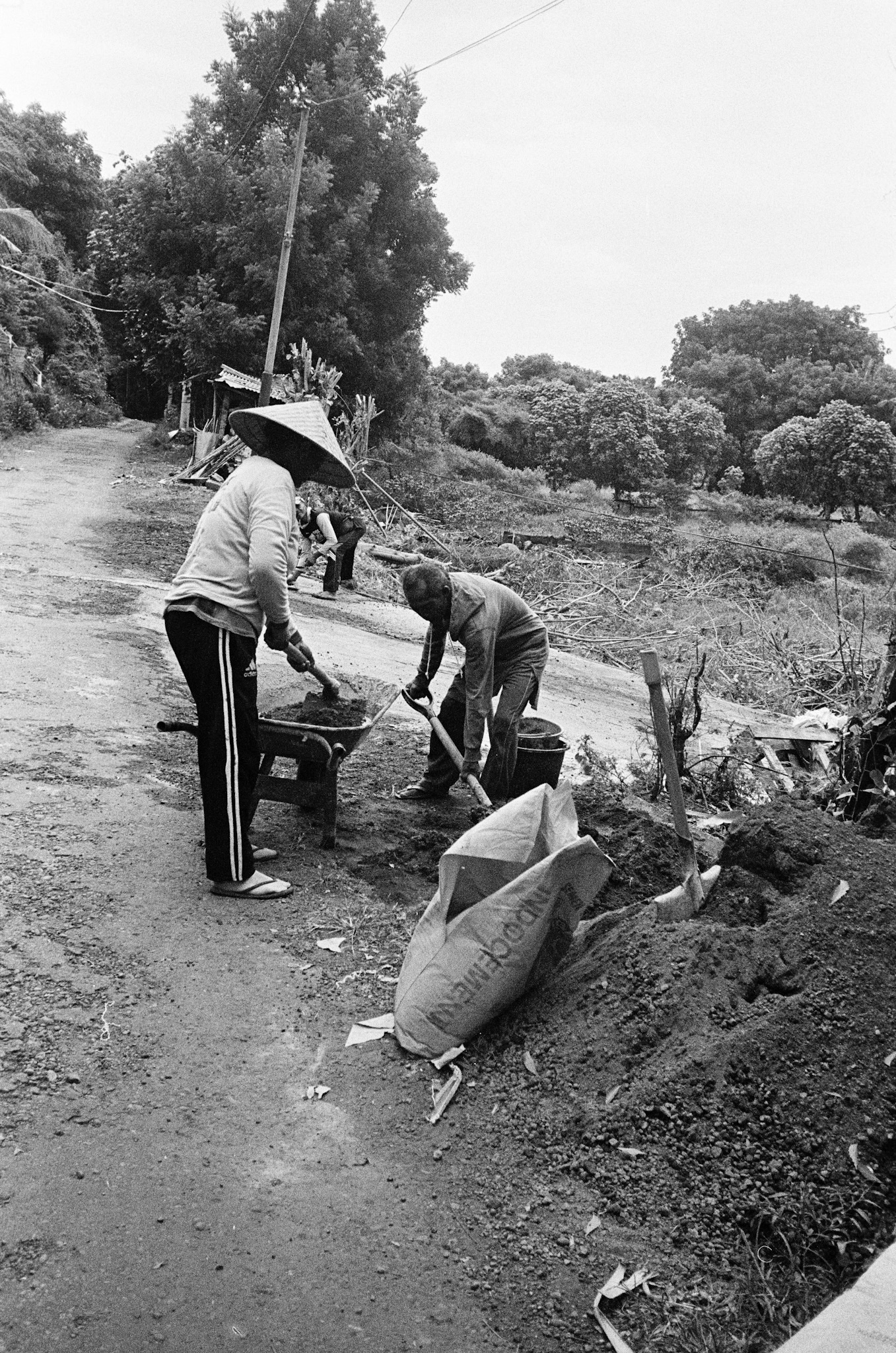 Island of the Gods - Workers on Dirt Road B&W