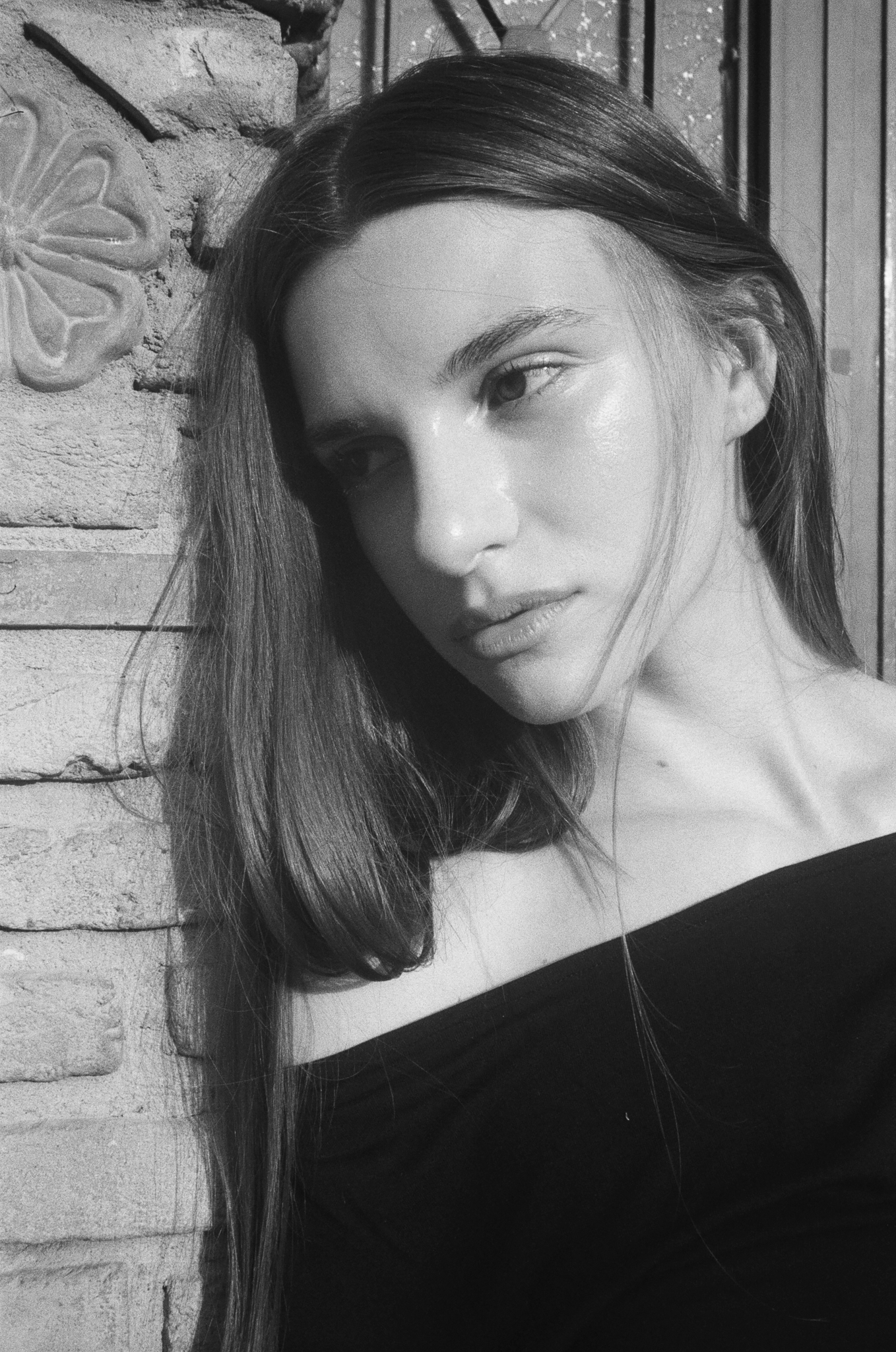 Stories of Greece - Portrait Against Brick Wall B&W
