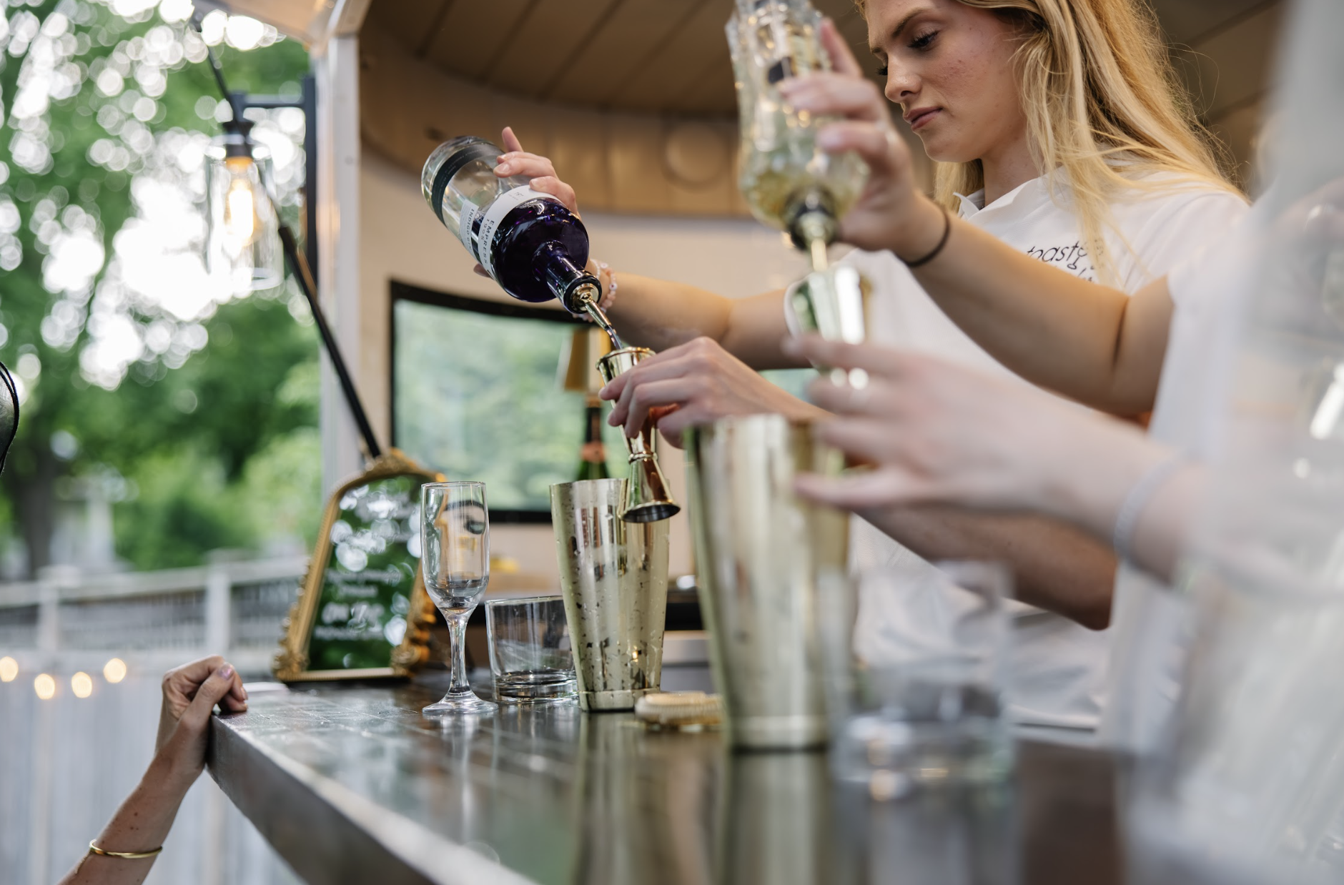 Bartender pouring drinks