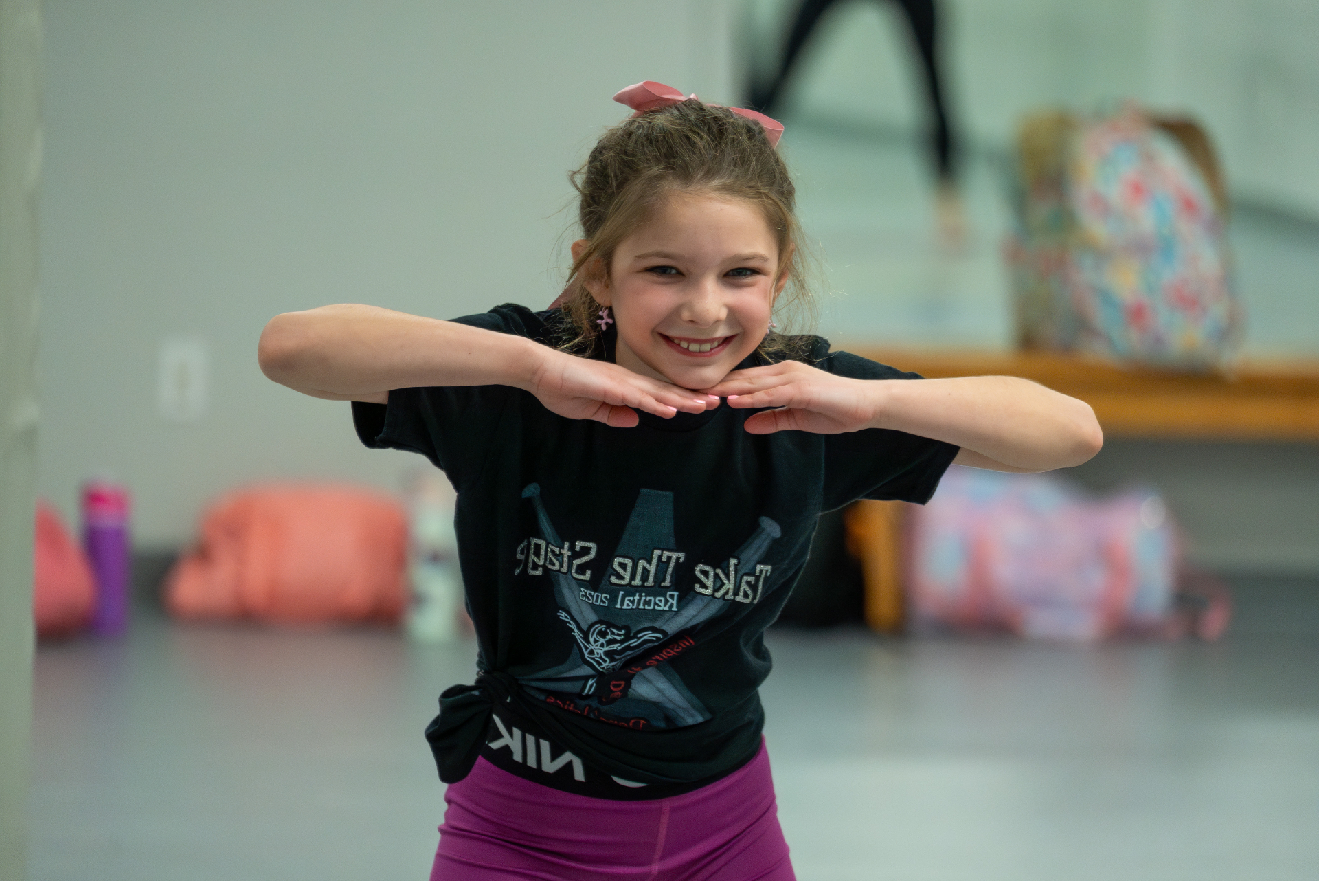 Happy young dancer posing at Danc'letics studio in Rochester, NY