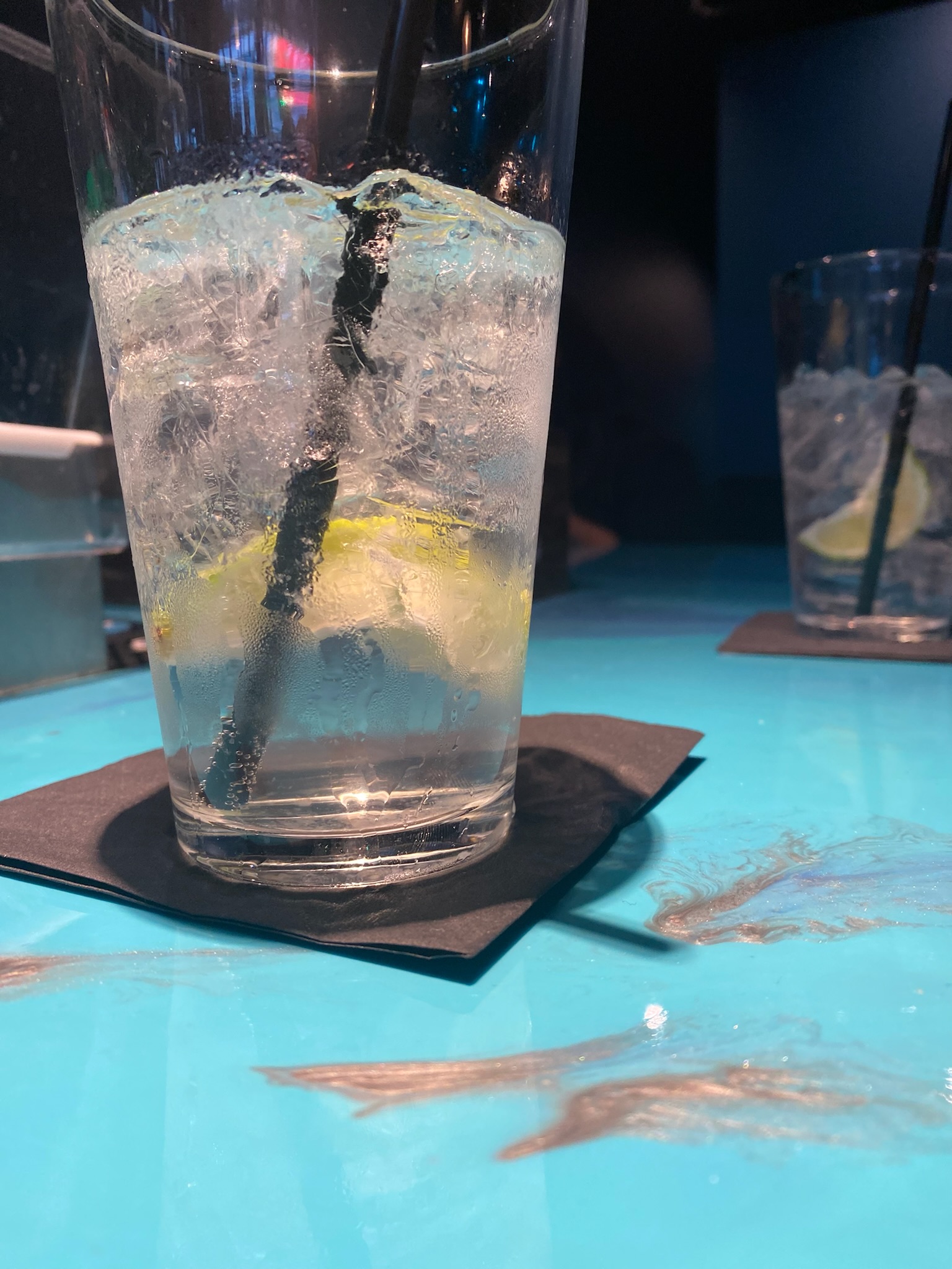 Drink on blue epoxy counter