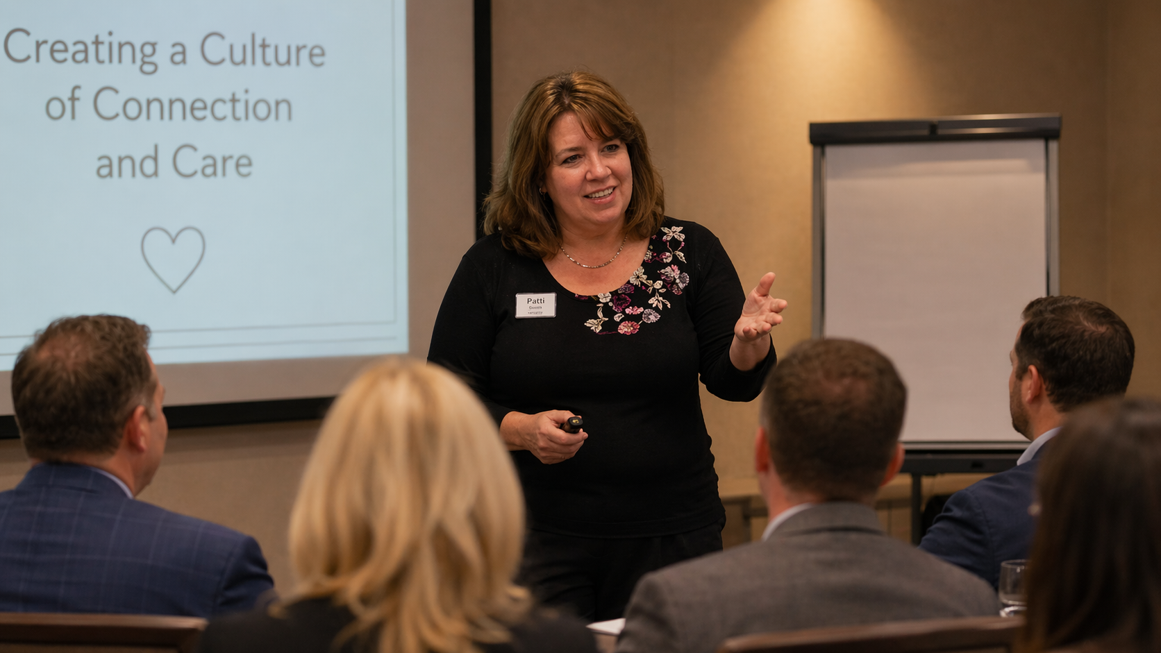 Patti Whitman keynote speaker delivering The ART of Being Remembered™ presentation