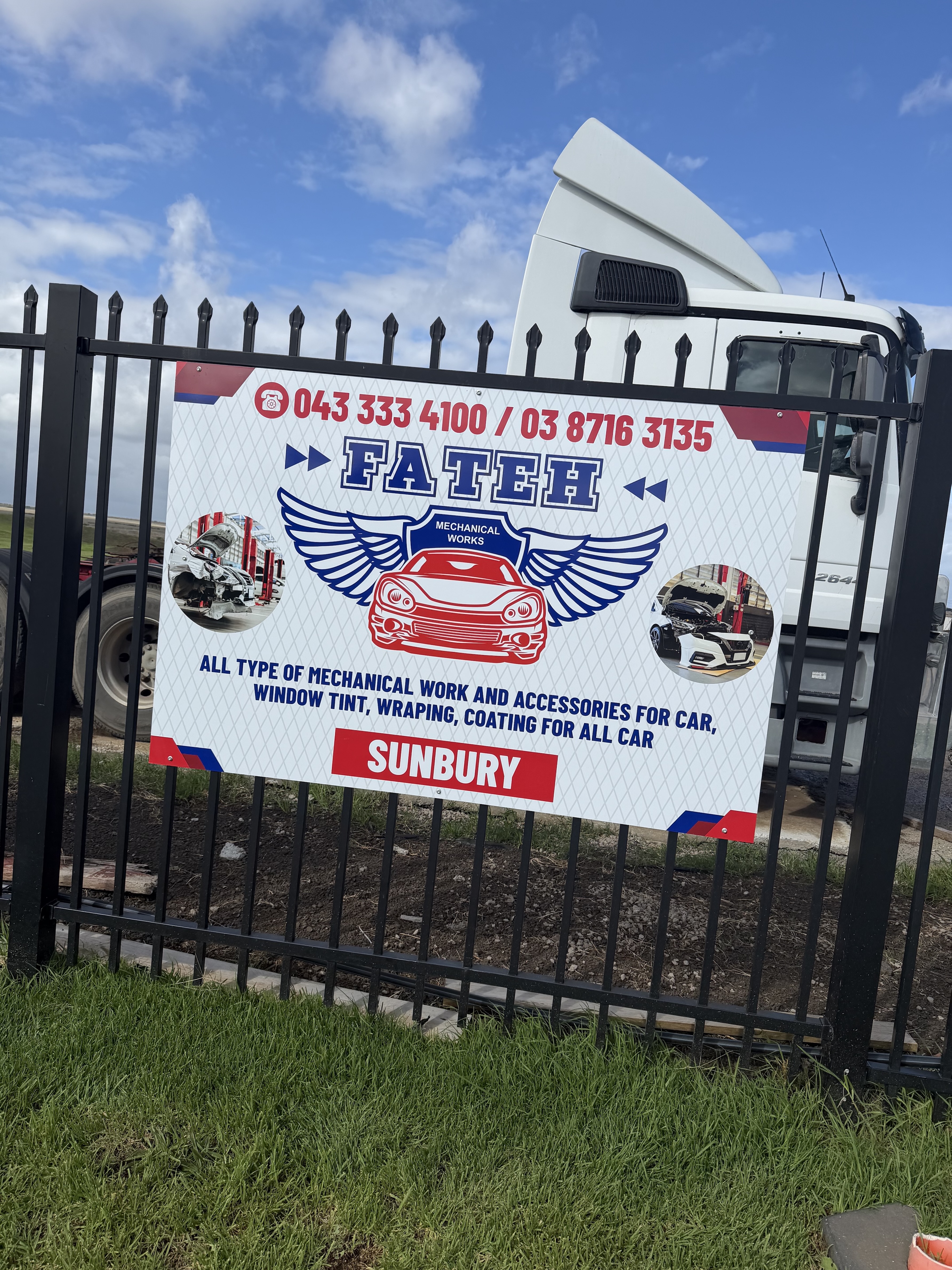 Fateh Mechanical Fence Sign