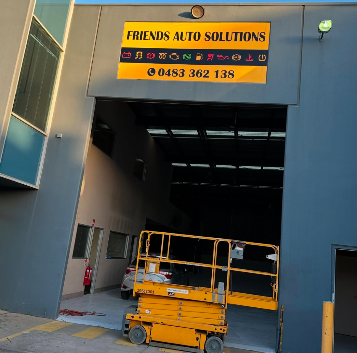 Friends Auto Warehouse Sign