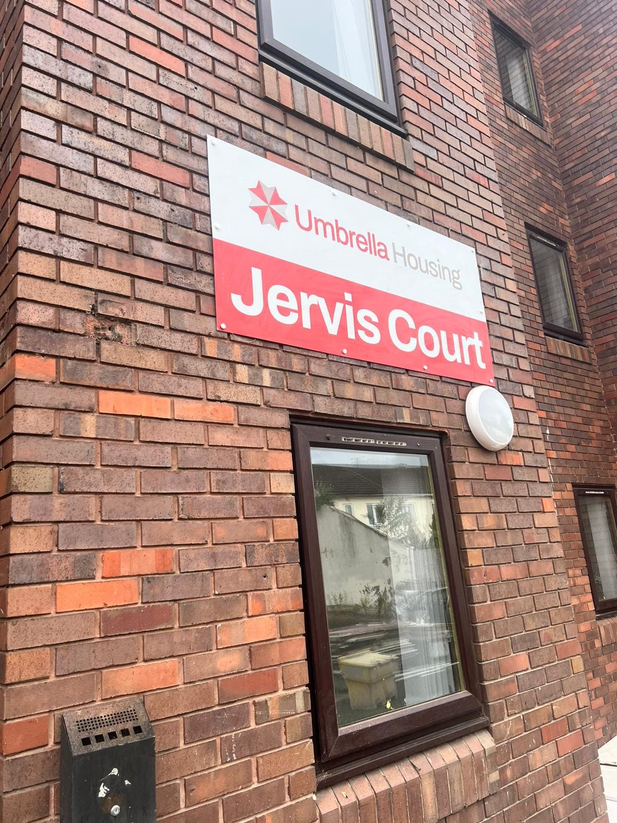 Umbrella Housing Exterior Sign
