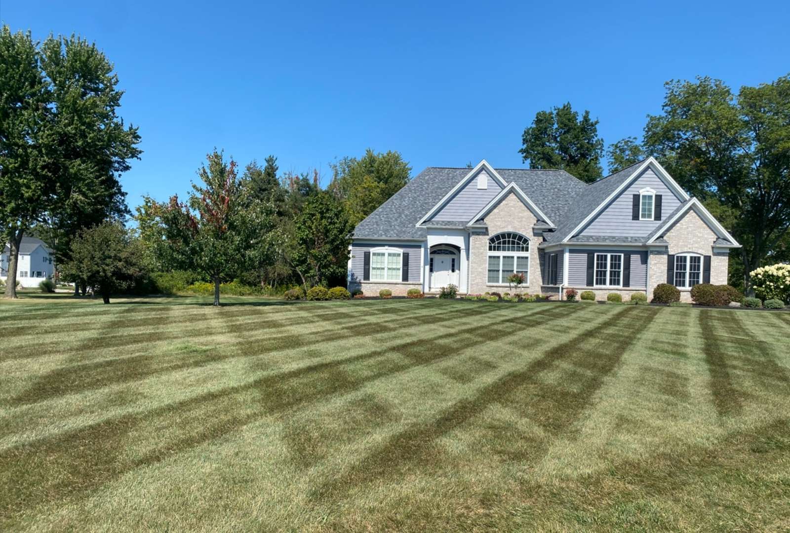 Aerial view of beautifully maintained property