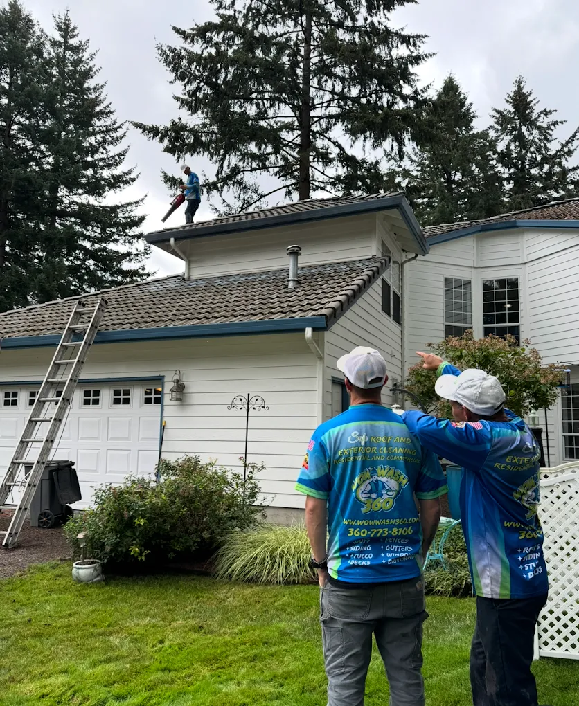 Team inspecting roof