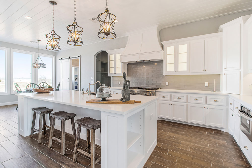 Beautiful staged modern kitchen with open floor plan and large island