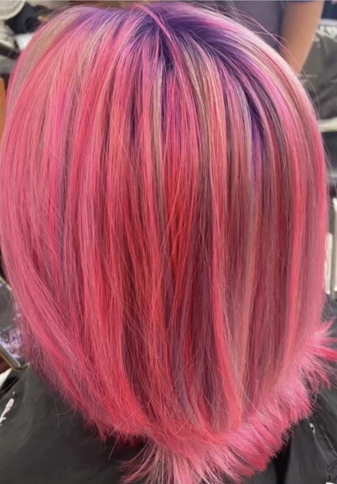 Vibrant custom fashion hair color transformation showing healthy, shiny results