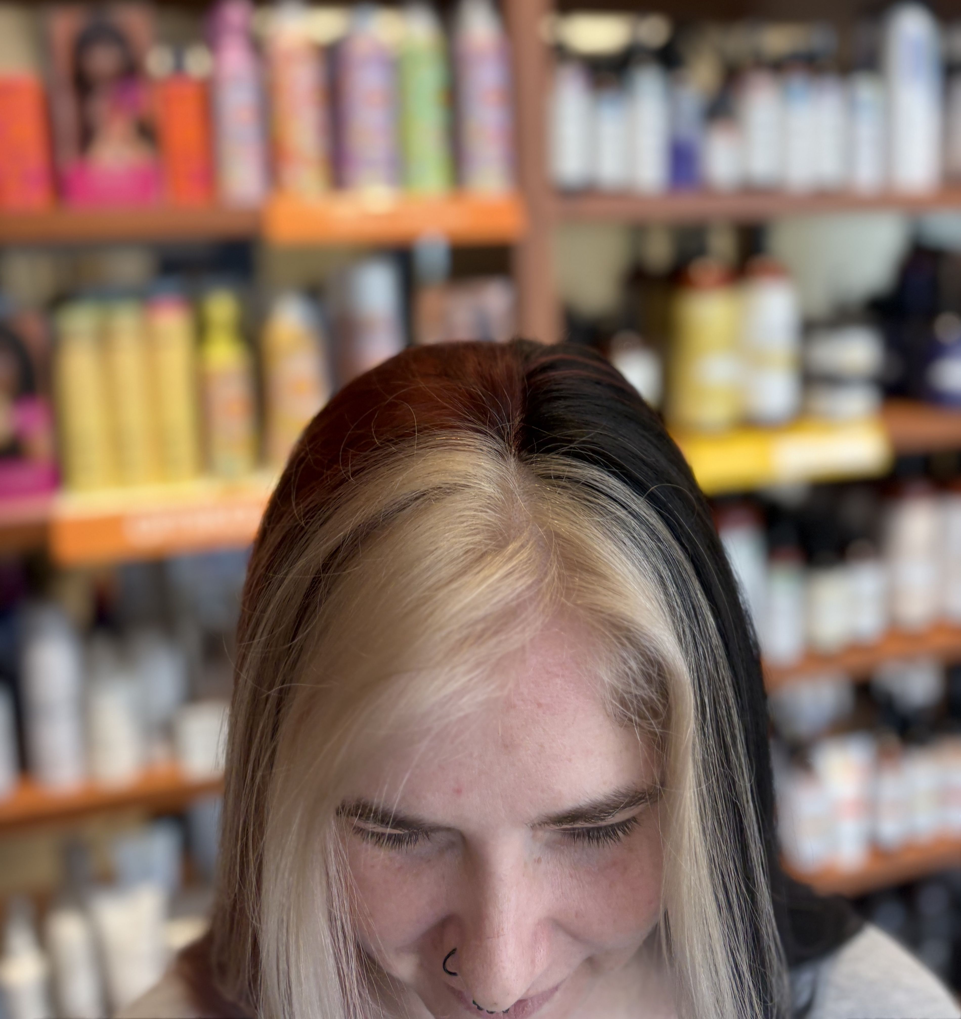 Top view of split color red and black with blonde money piece