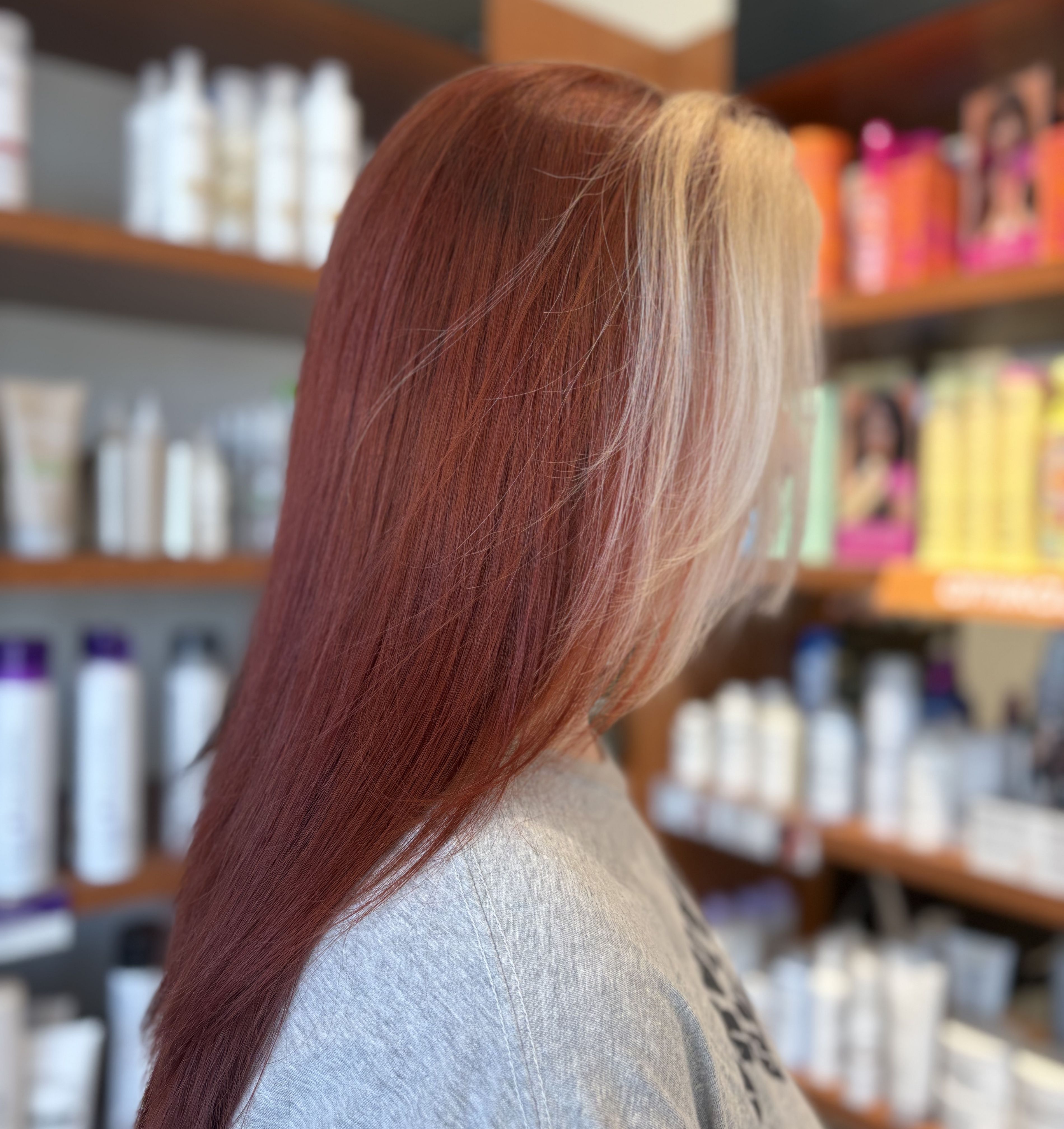 Side view showing vibrant red hair color