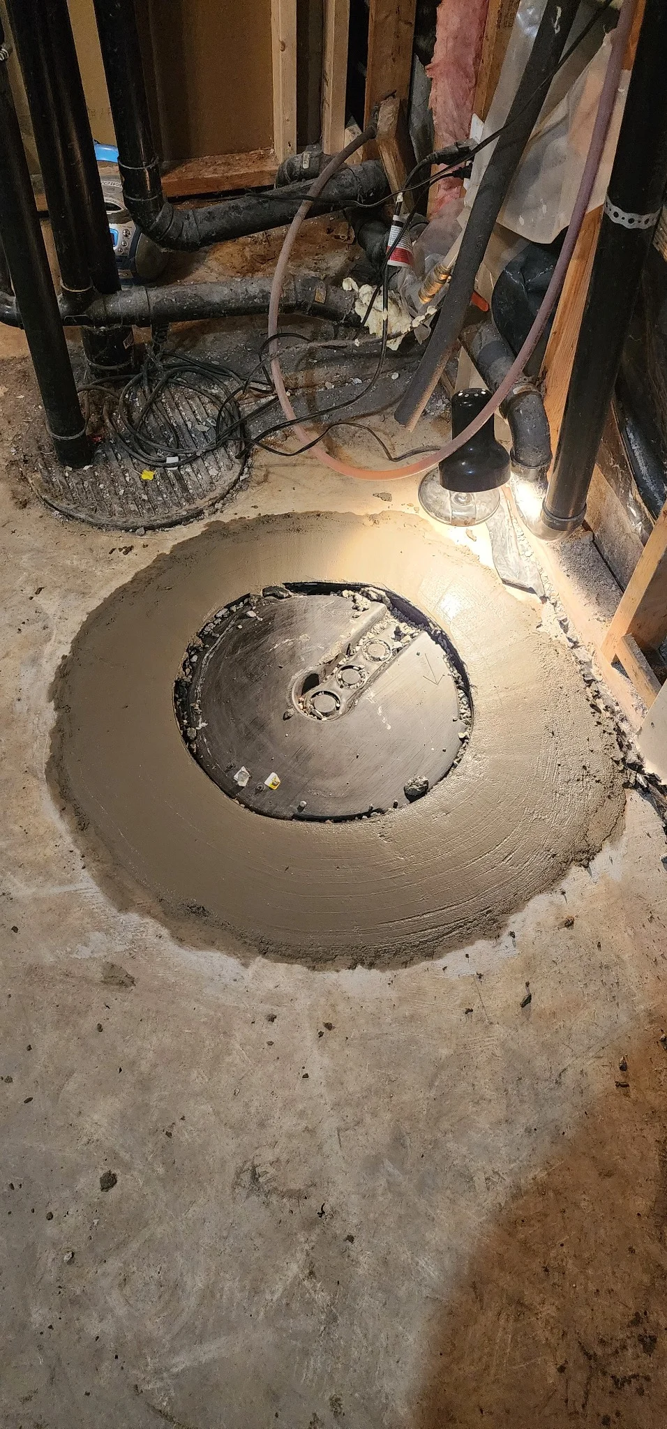 Sump pump pit installation