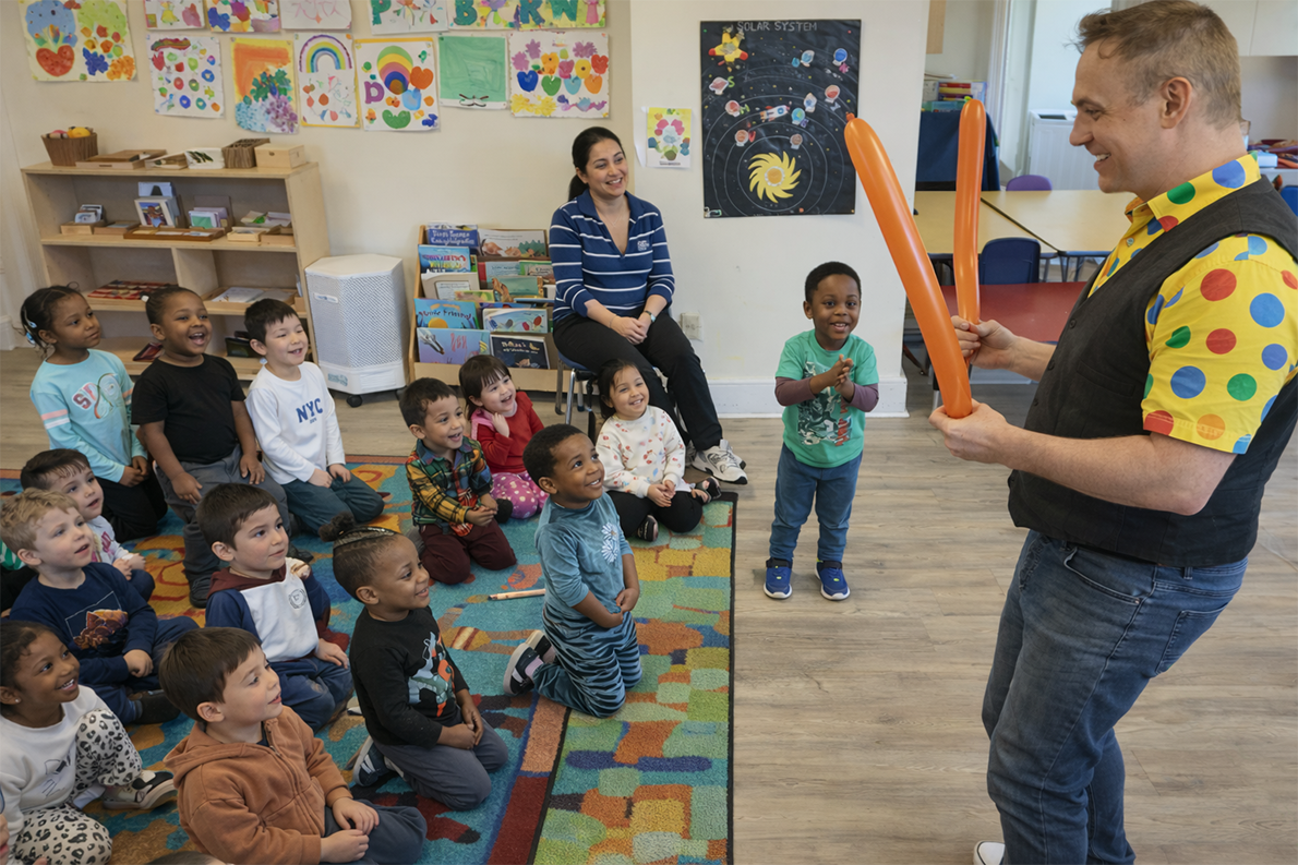 Magician performing for a group of children at a childcare center