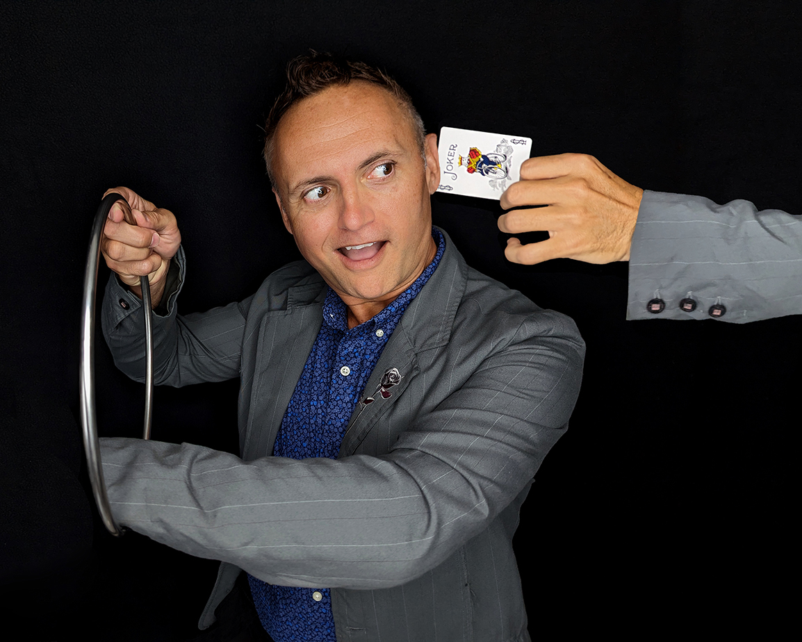 Jokus Pocus performing a magic trick