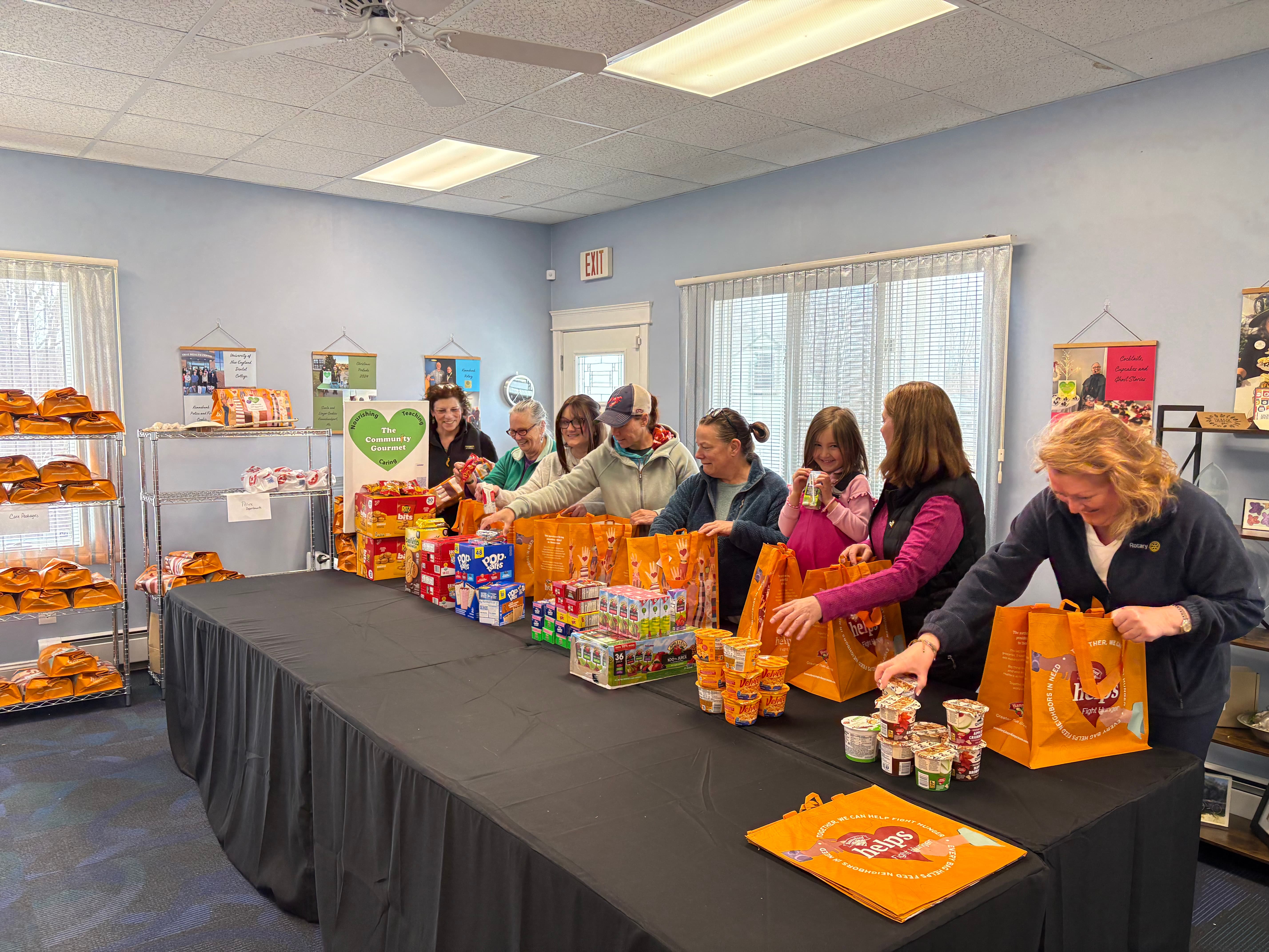Volunteers preparing food