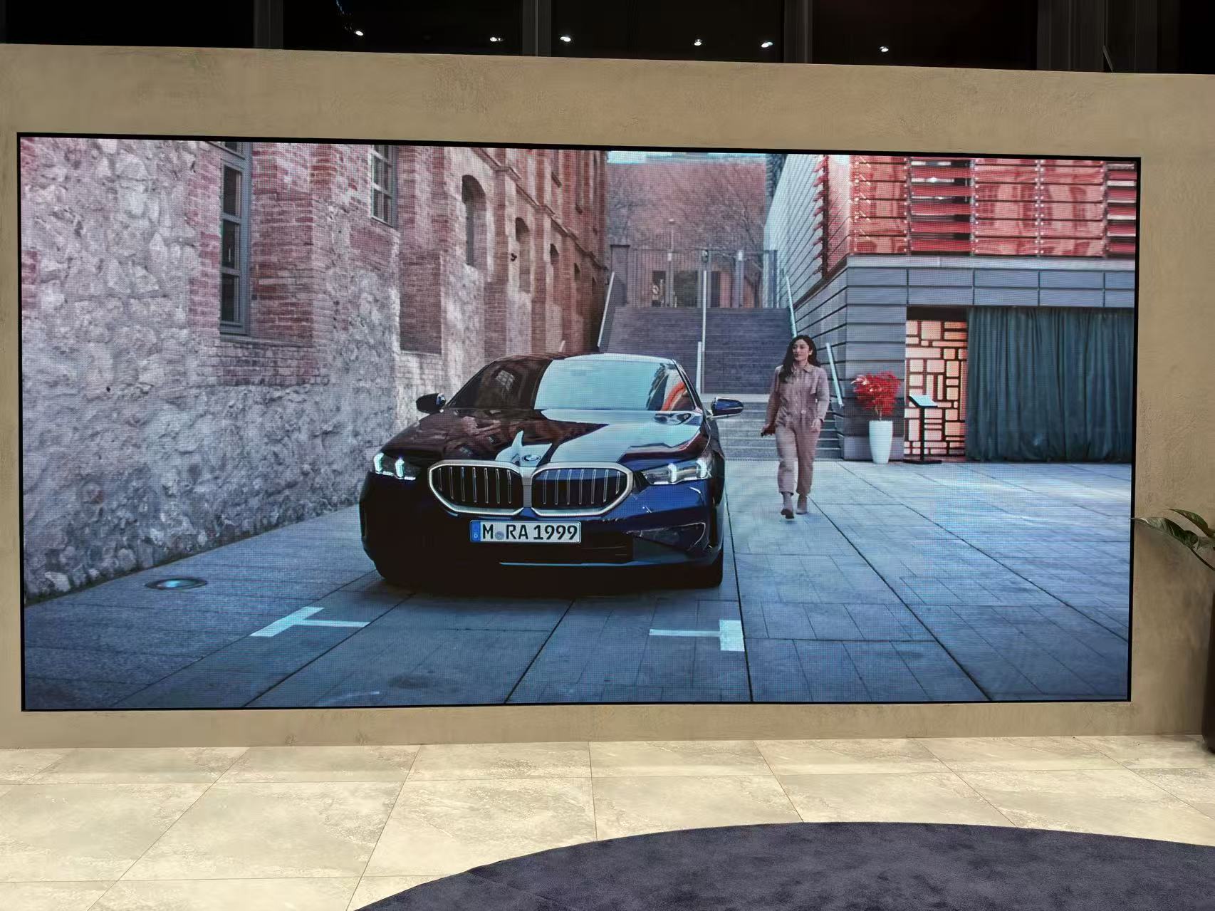 Large horizontal LED Video Wall showing car advertisement