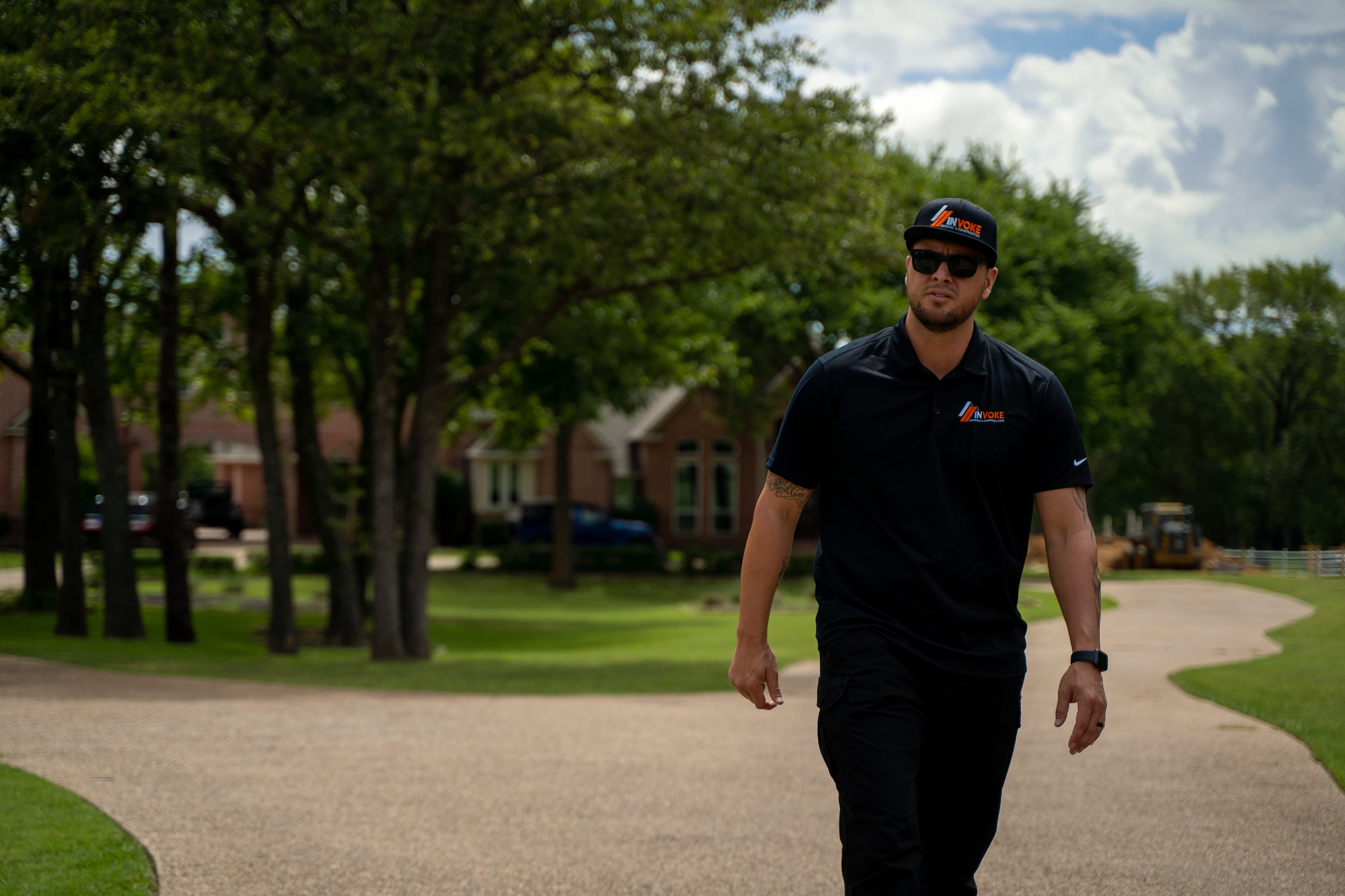 Invoke Roofing team member walking