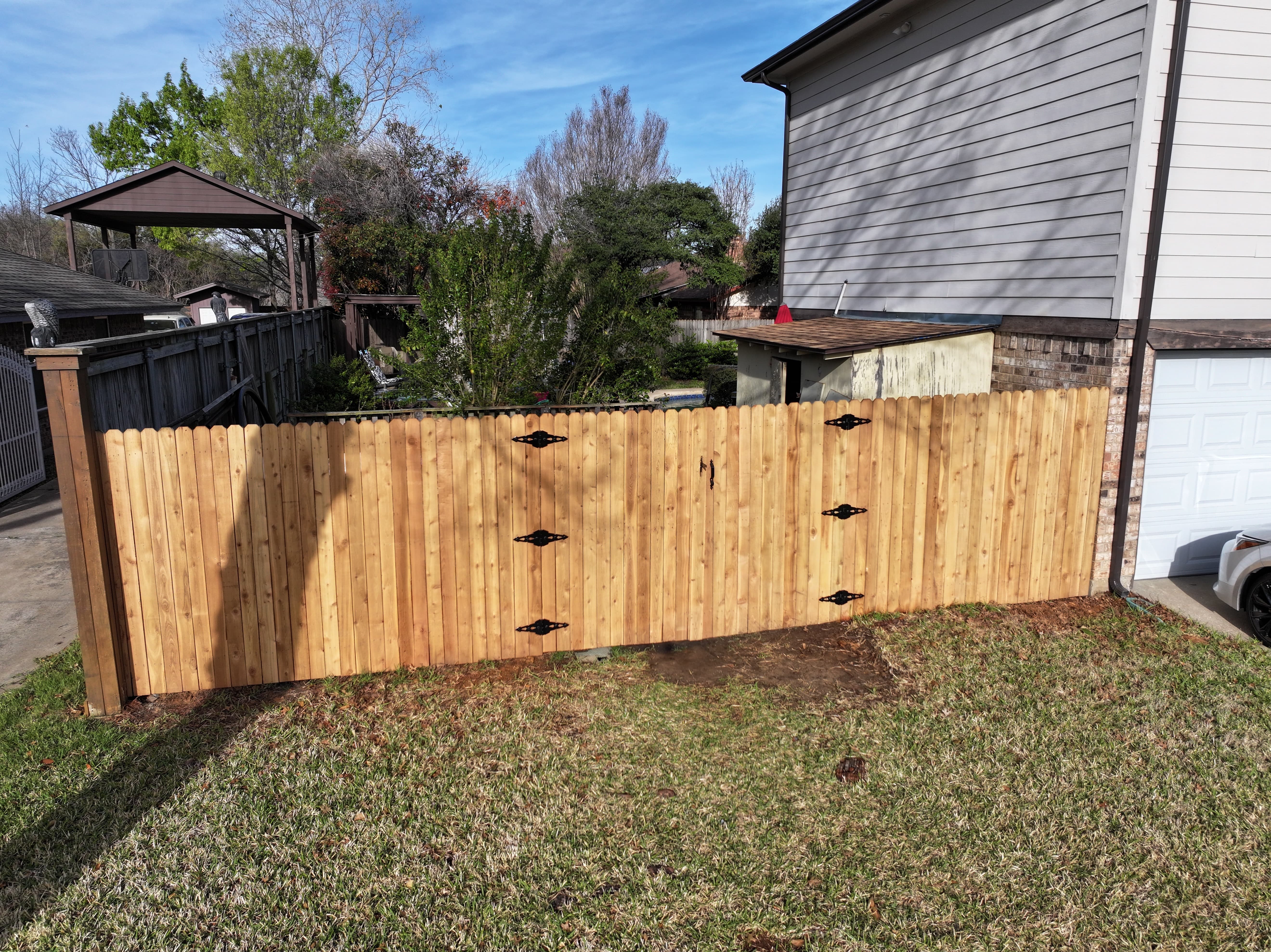 New wooden fence installation