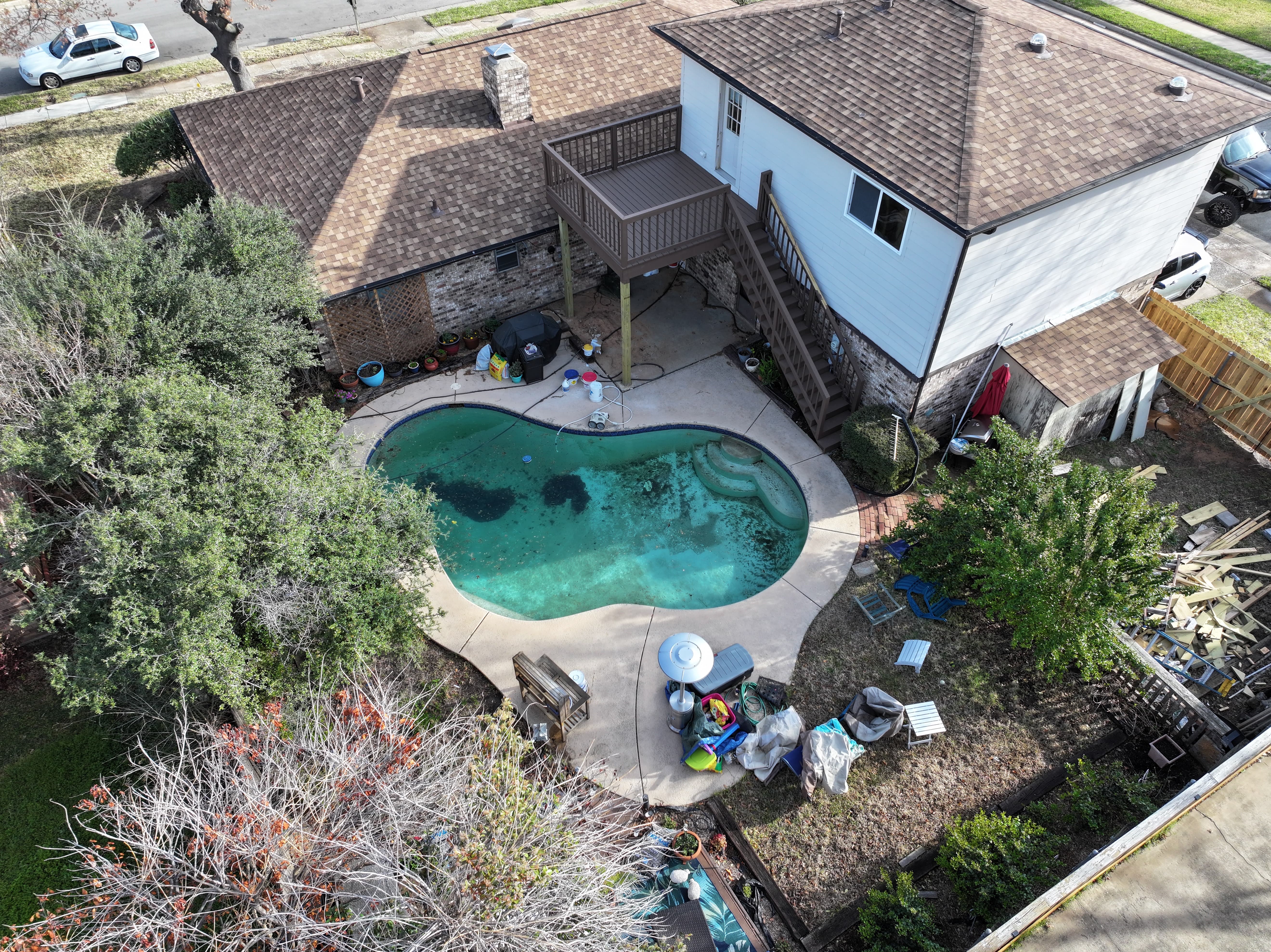 Overhead view of backyard and roof