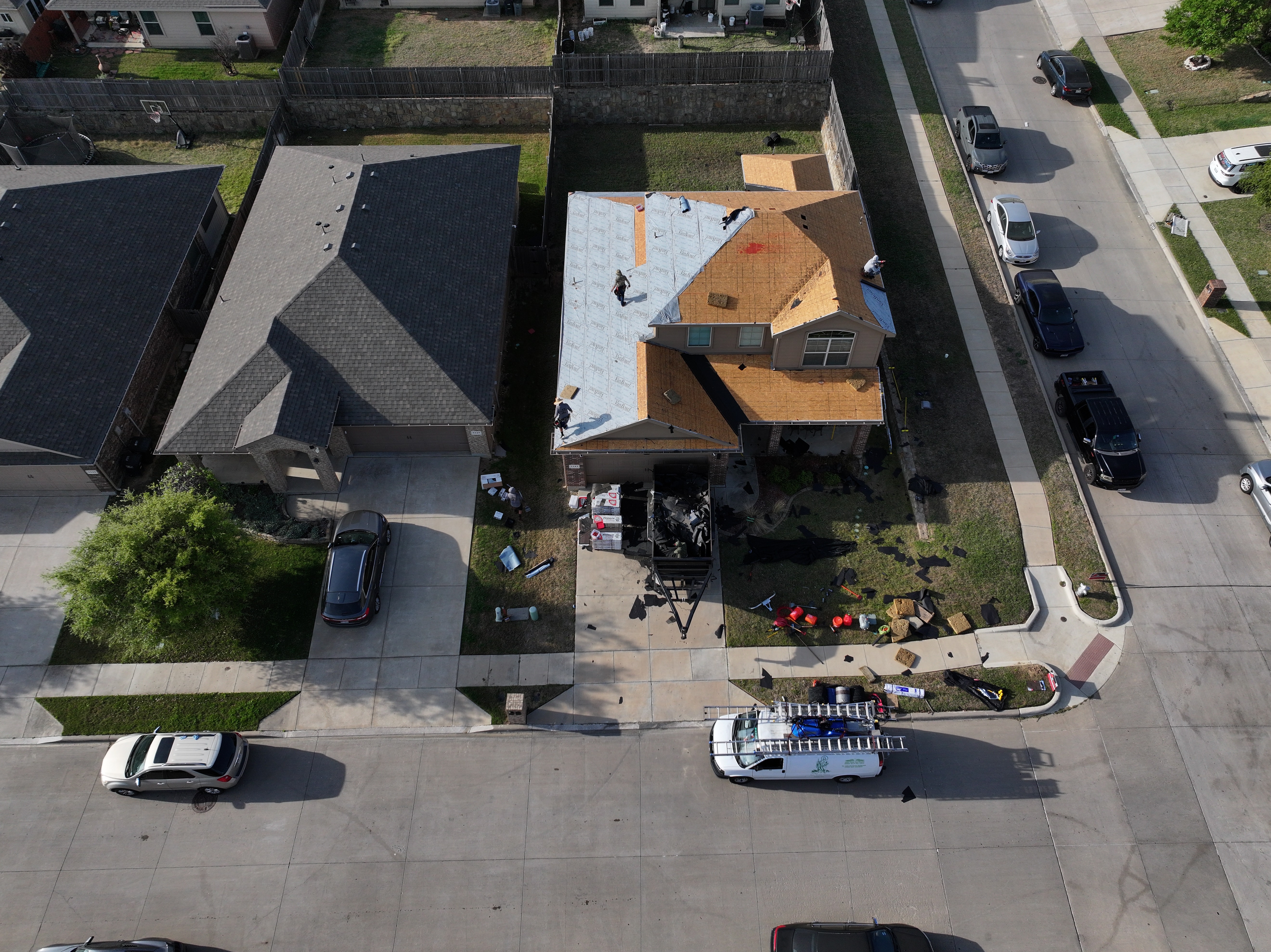 Roofing replacement process overhead view