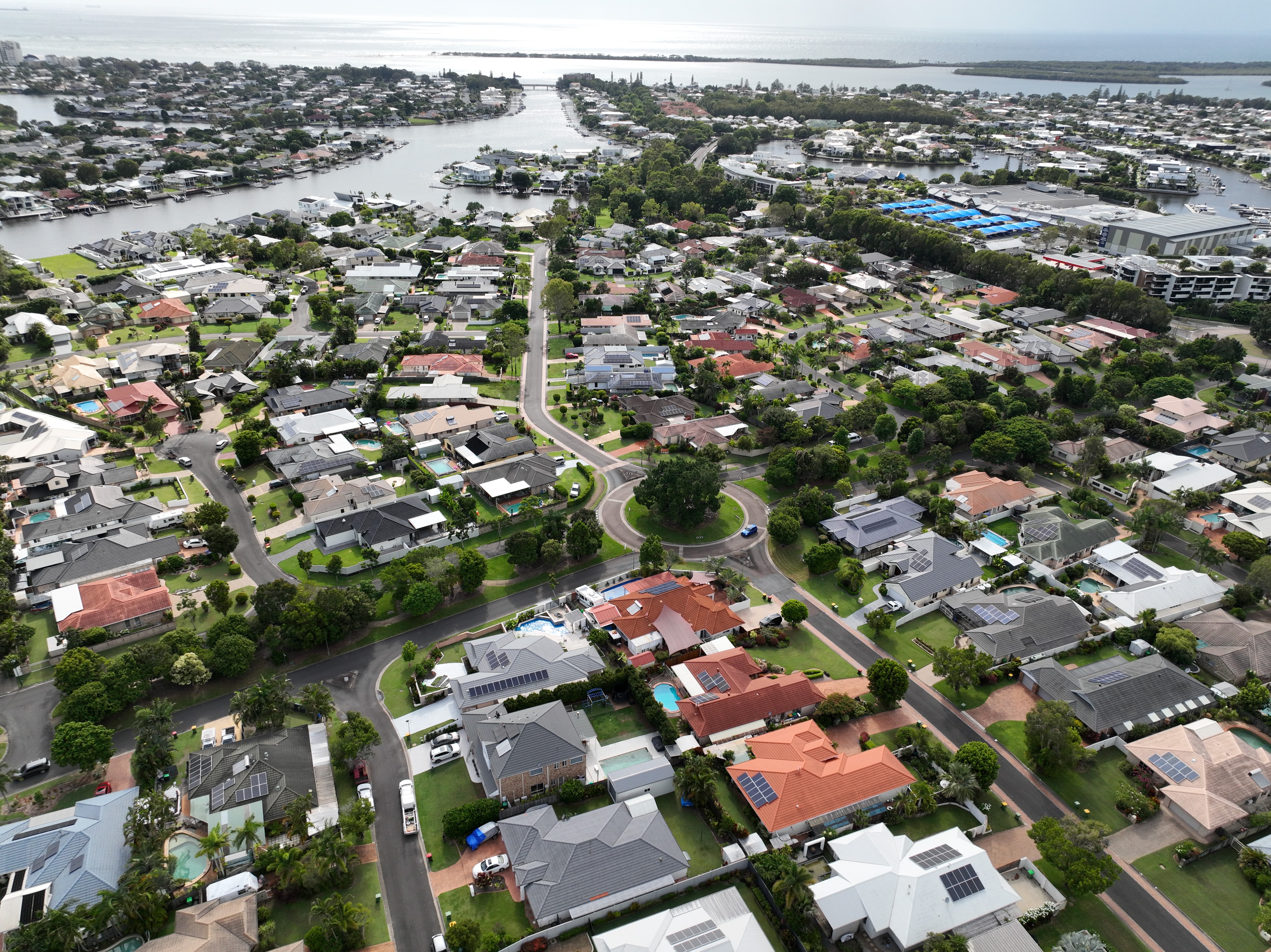 Aerial view of solar panels on homes on the Sunshine Coast