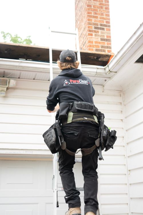 Roof Maxx performance check-up: ARR technician inspecting shingles on an Acadiana home