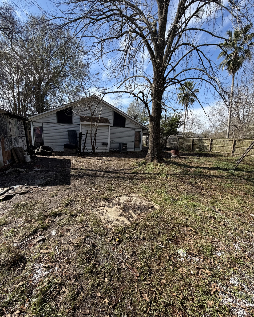 Clean yard after residential junk removal