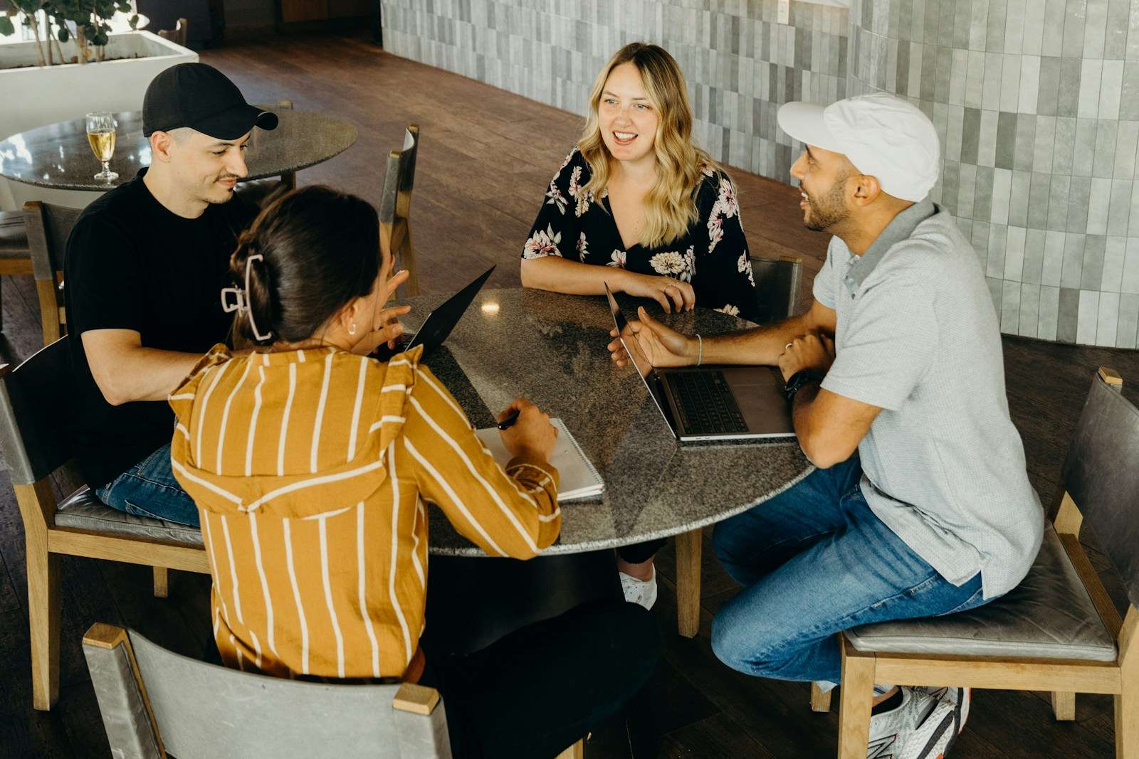 A group of people sitting around a table collaborating